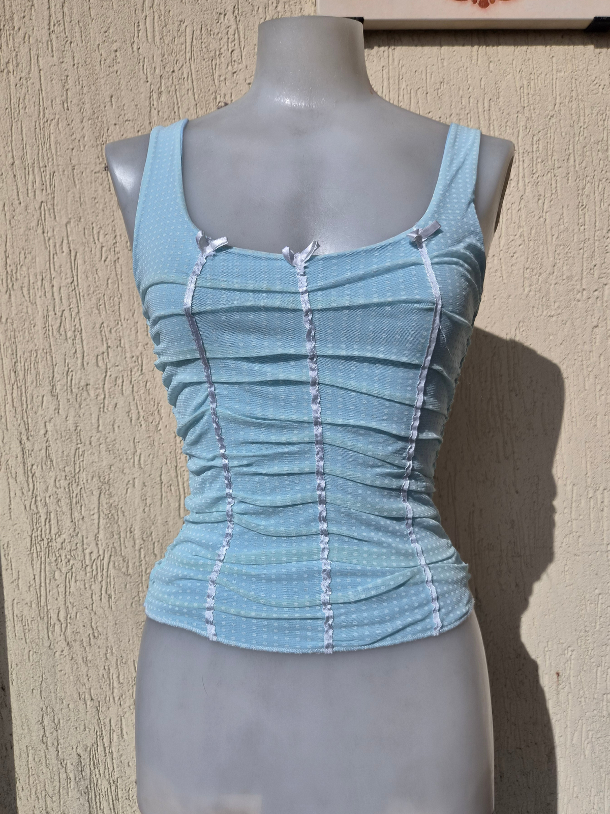 Blue pleated voile top with polka dots