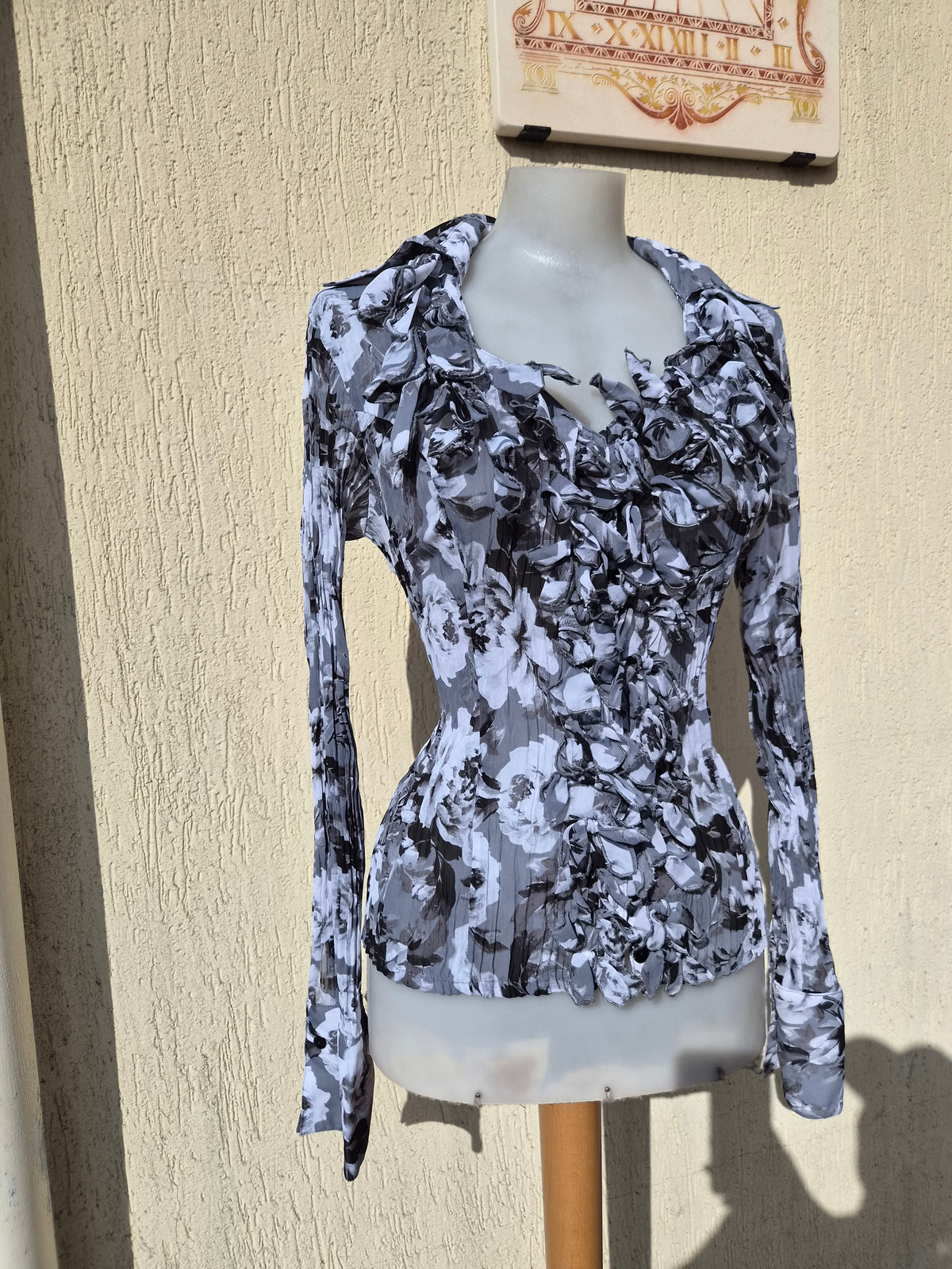Grey-toned ruffled blouse