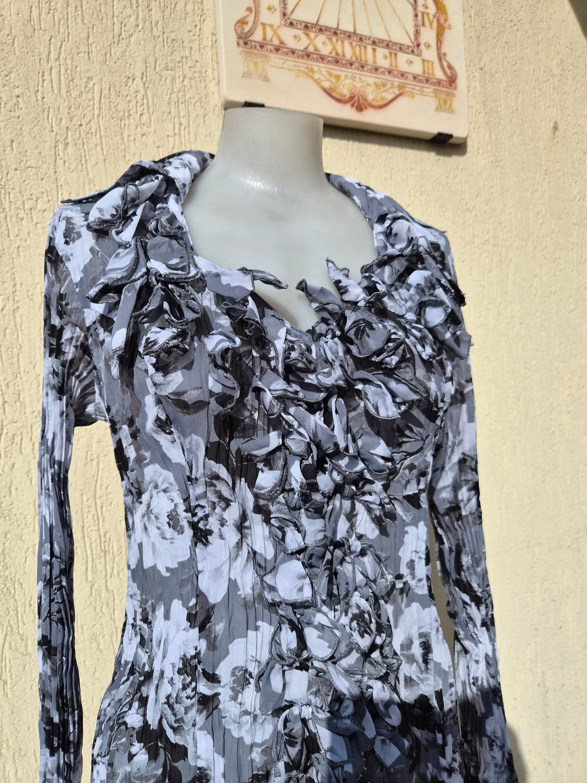 Grey-toned ruffled blouse