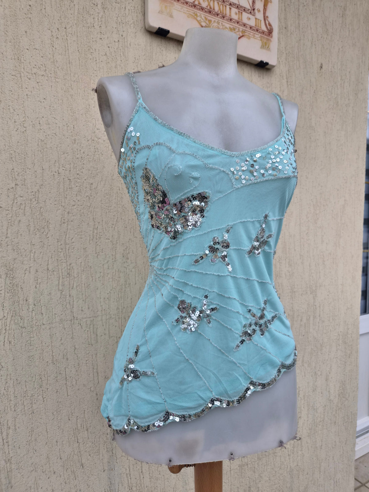 Blue top embroidered with silver sequins