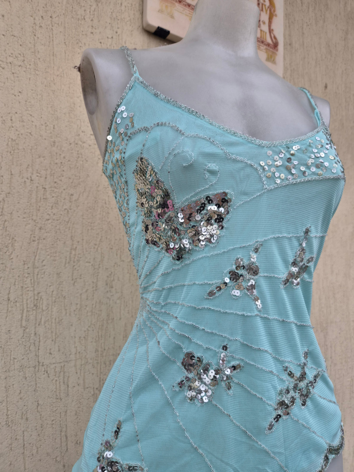 Blue top embroidered with silver sequins