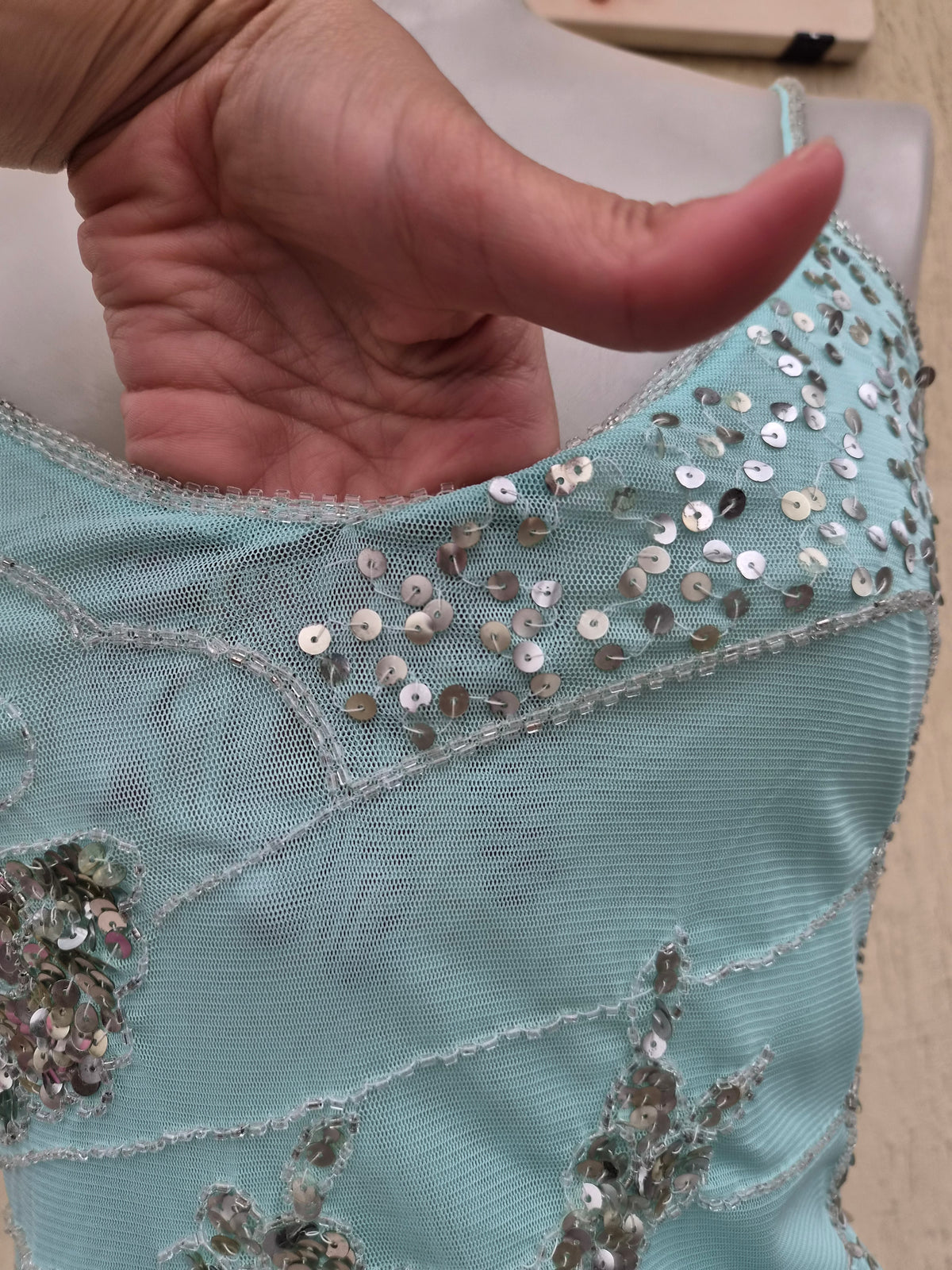 Blue top embroidered with silver sequins