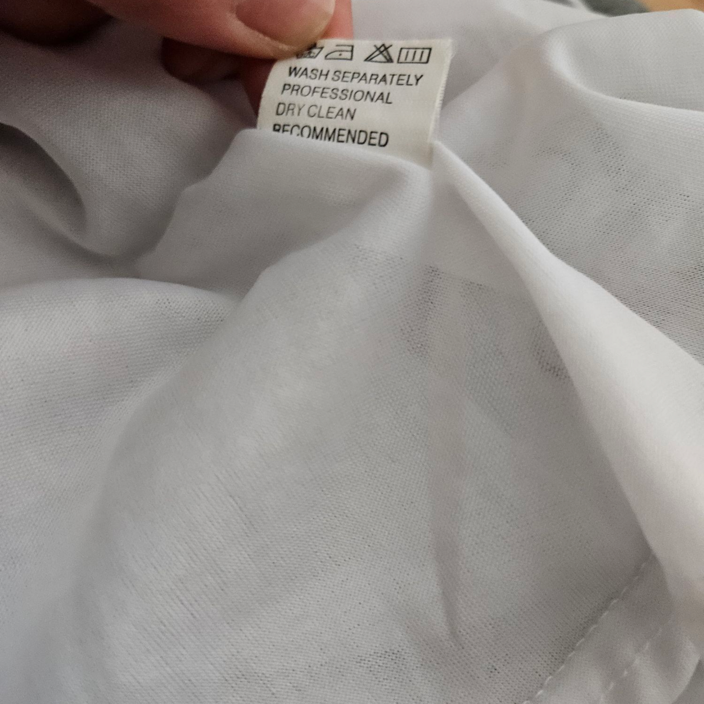 Asymmetrical top in embroidered voile