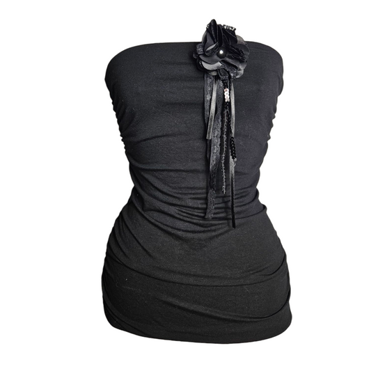 Black strapless top with brooch