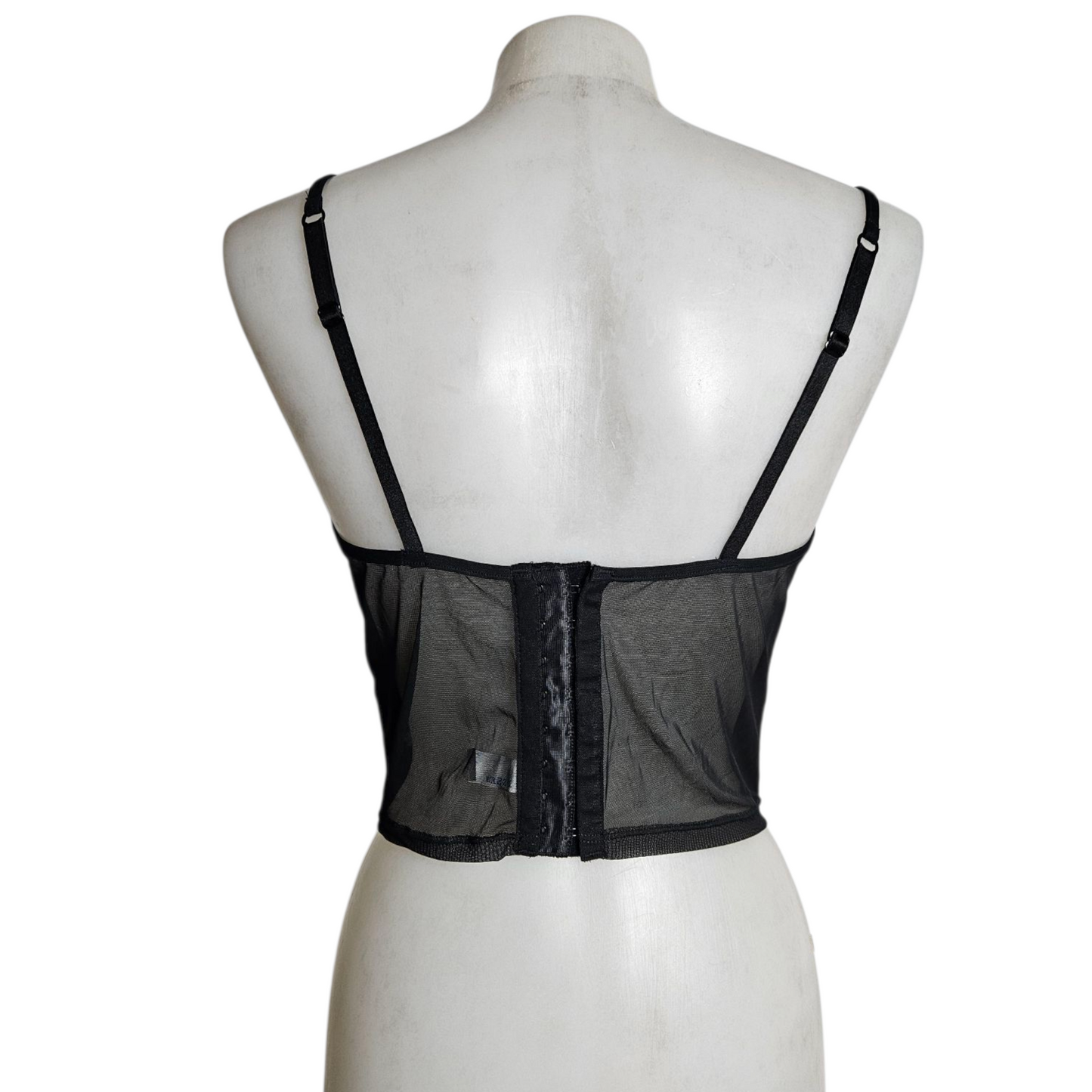 Corset-style top with a velvet pattern