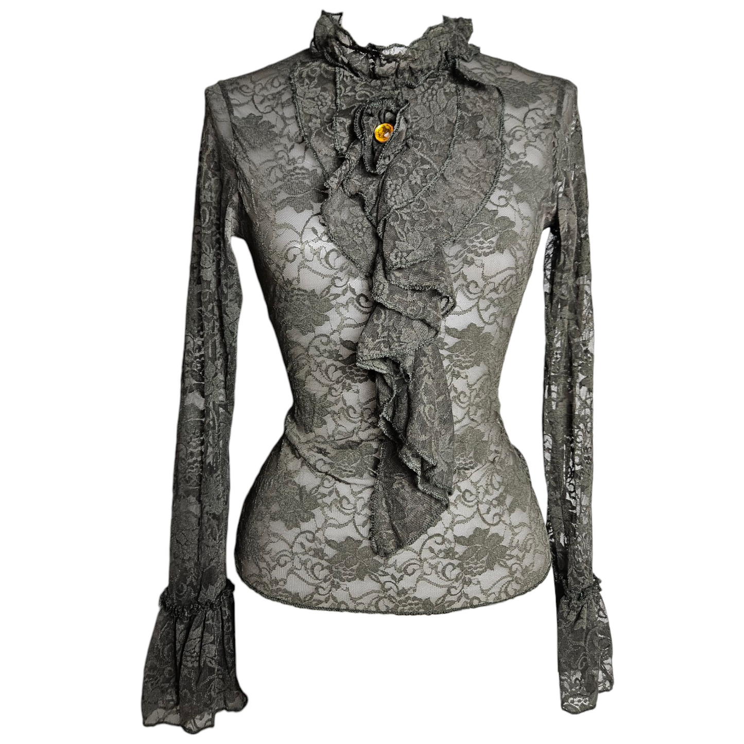 Lace blouse with ruffle details and brooch
