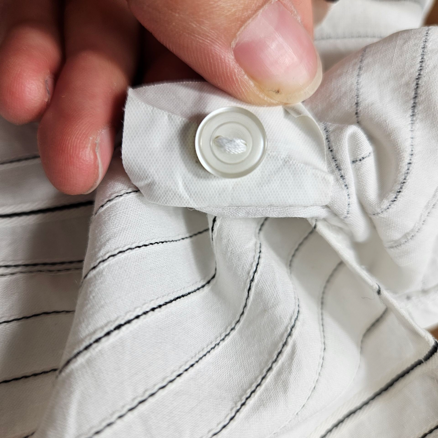 Chemise blanche fermeture agrafes