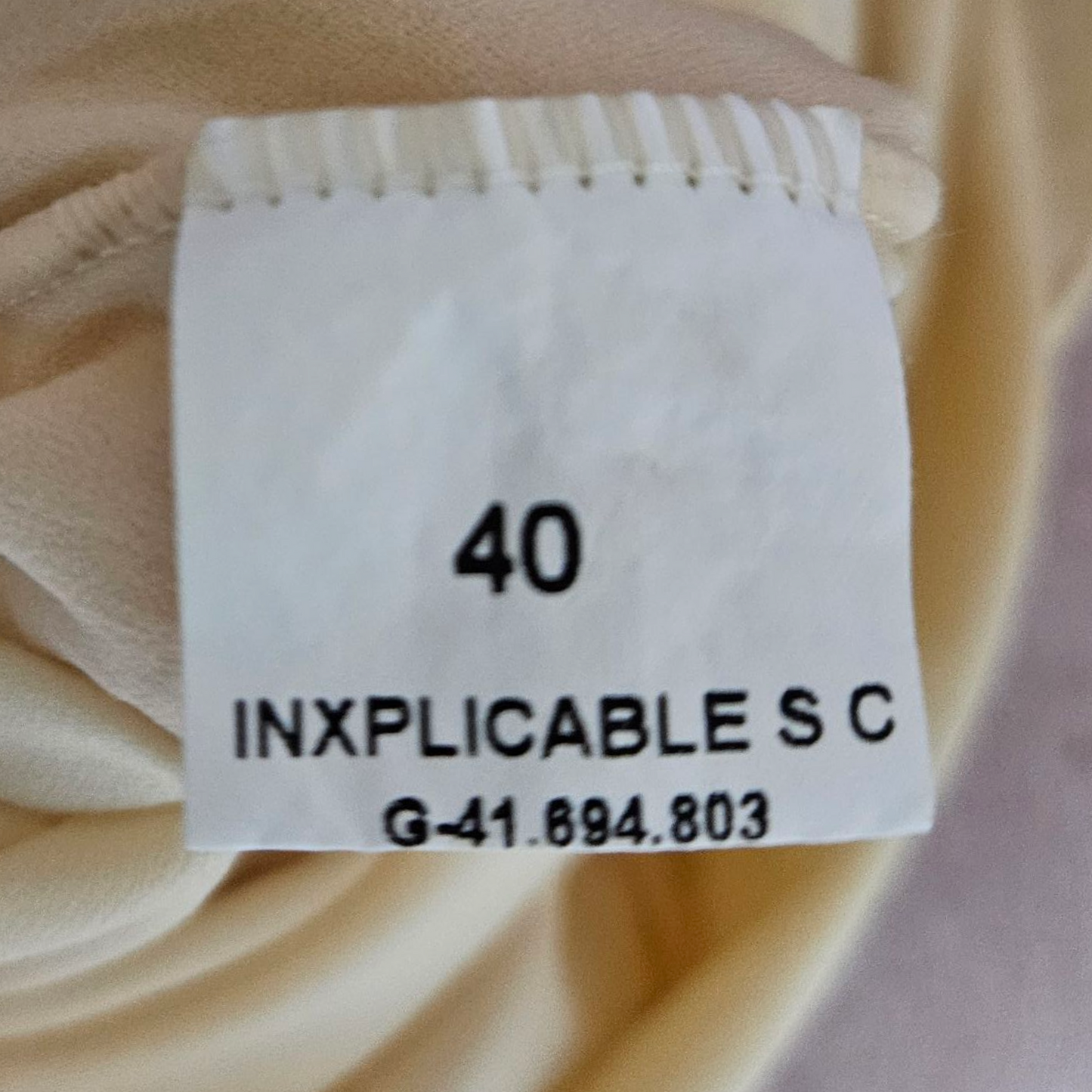 Robe asymétrique en voile dos nu