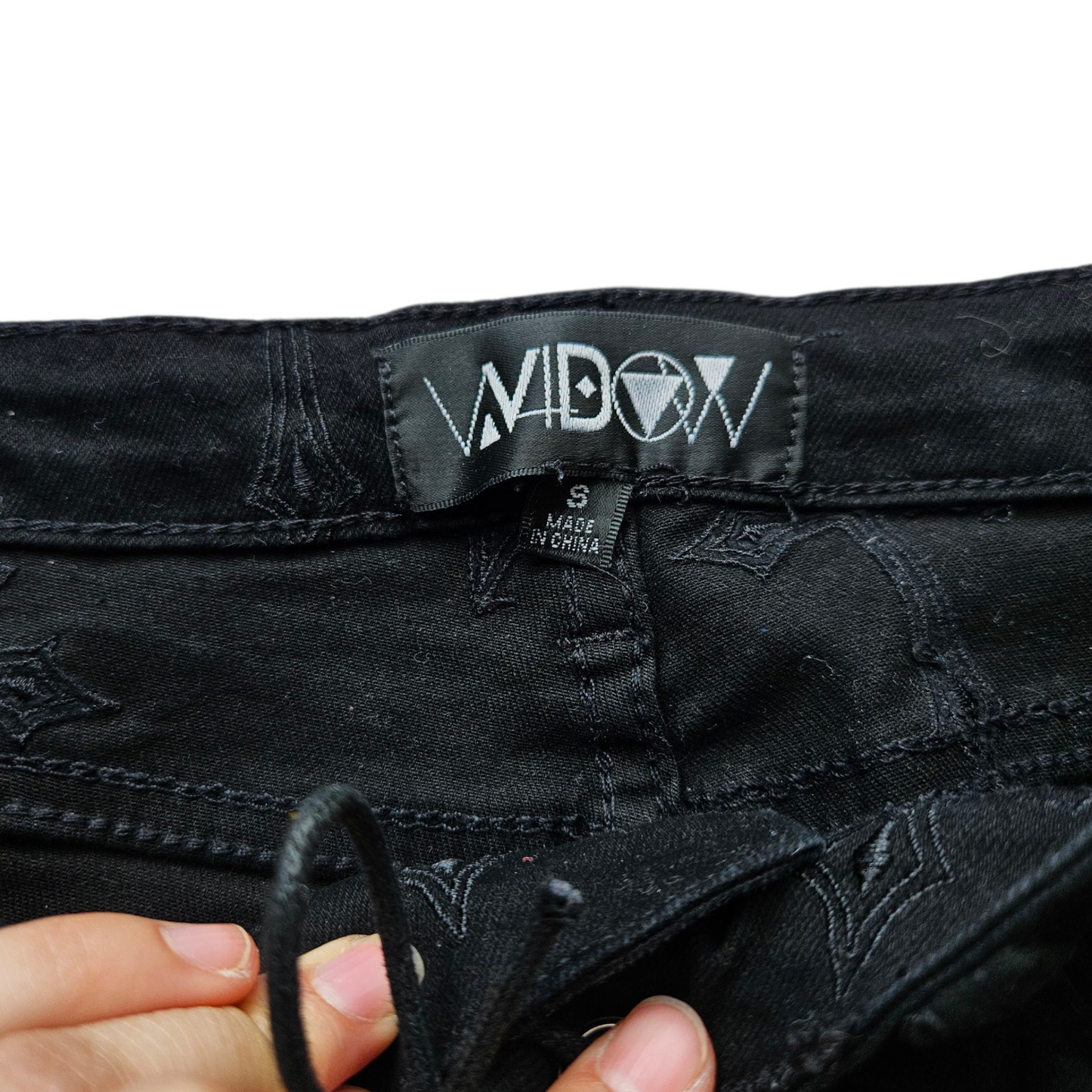 Black cross embroidered pants
