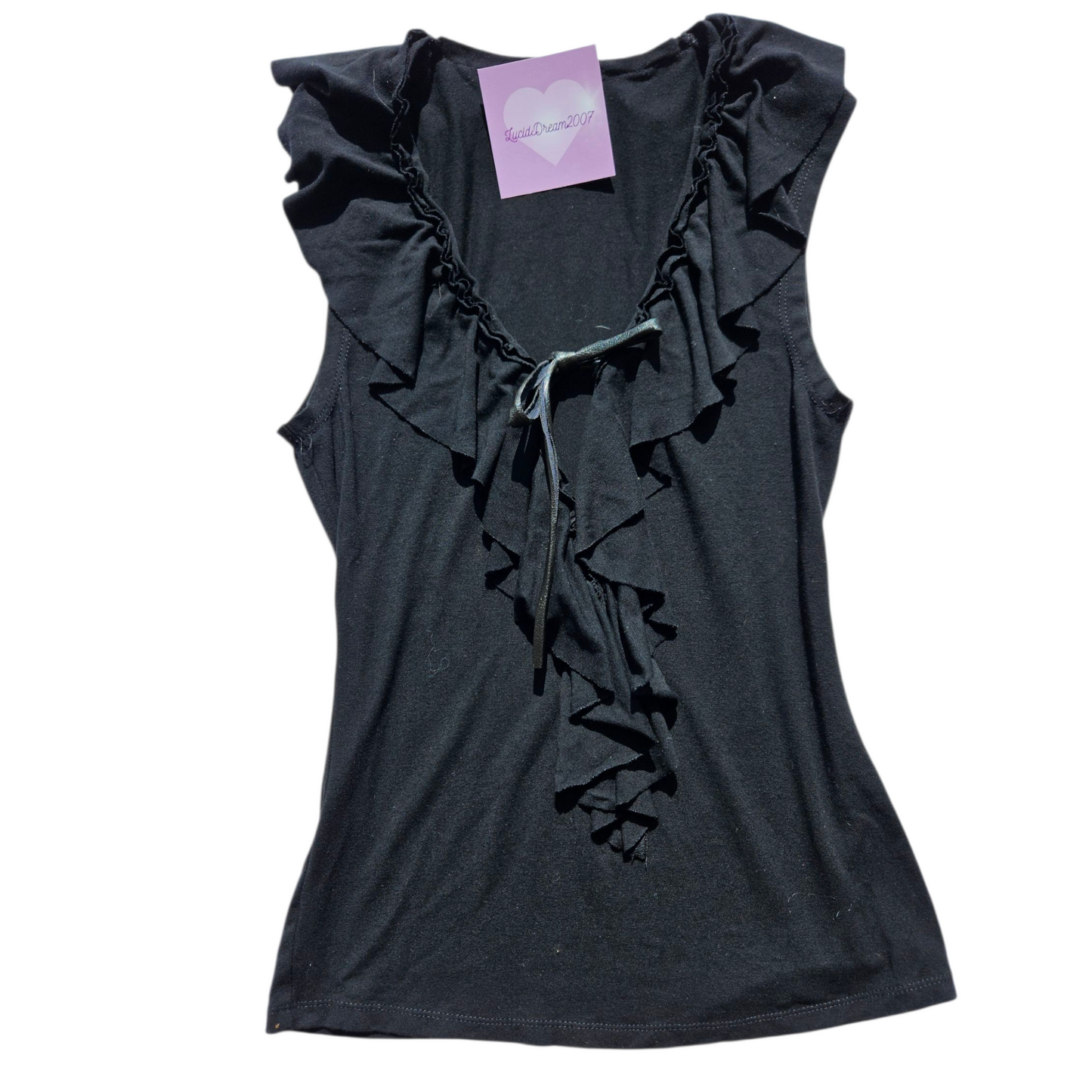 Black top with ruffled collar
