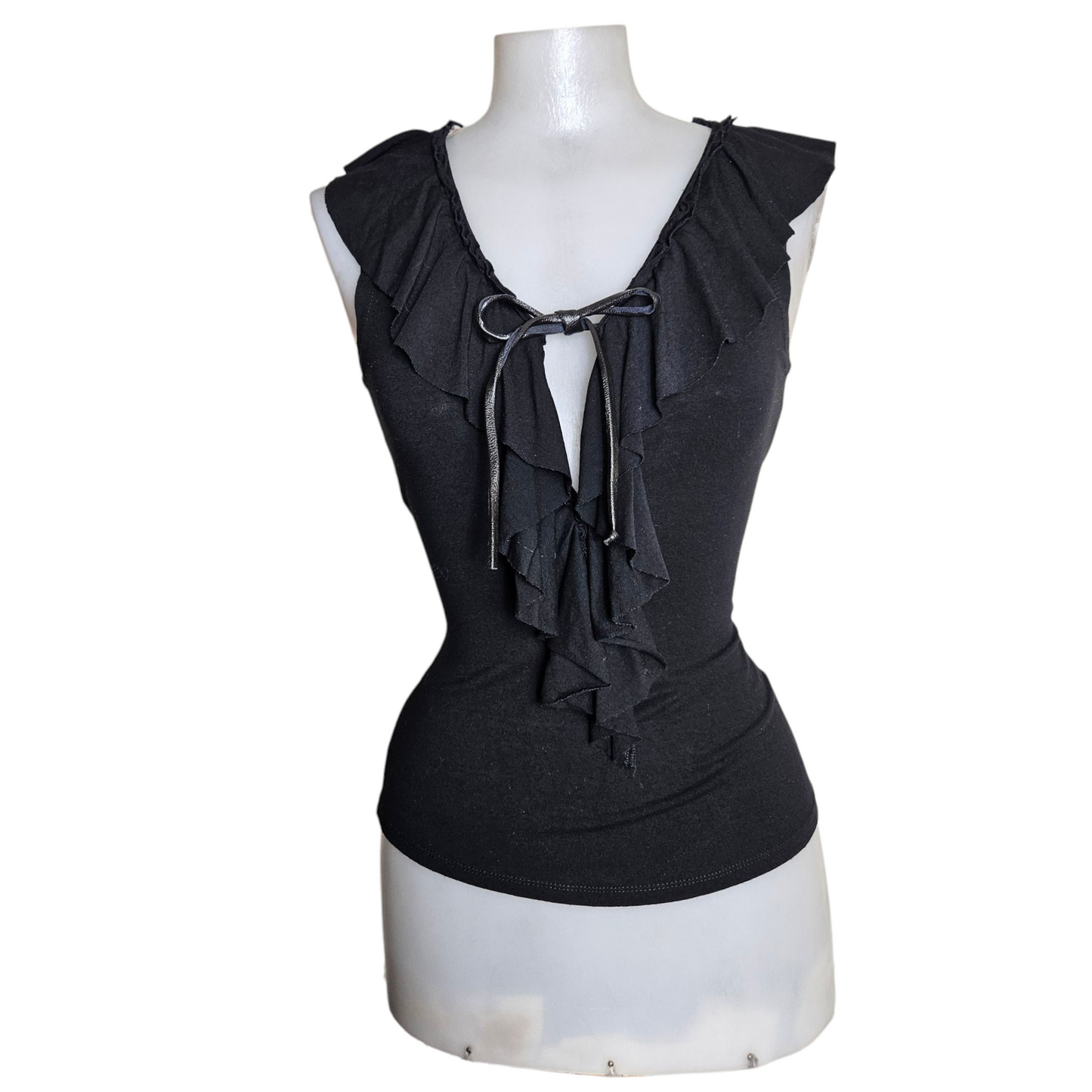 Black top with ruffled collar