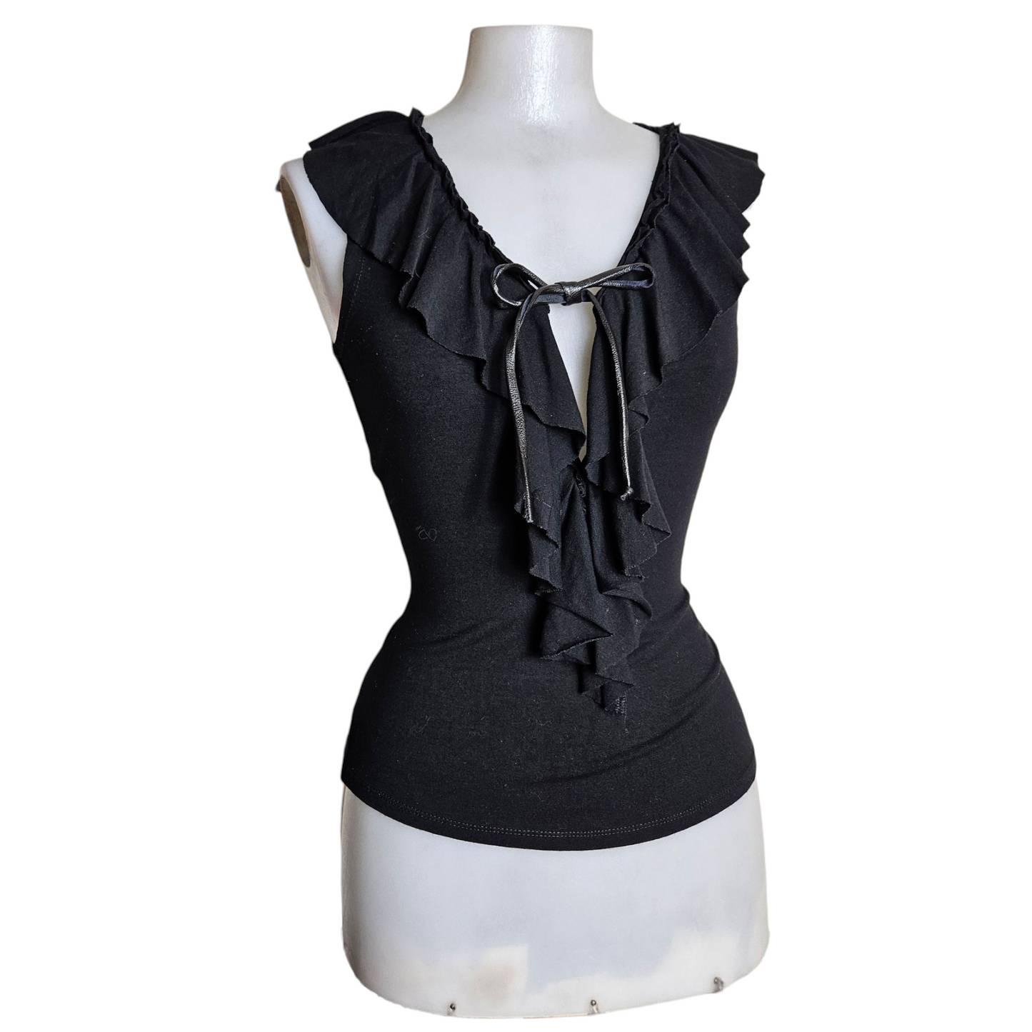 Black top with ruffled collar