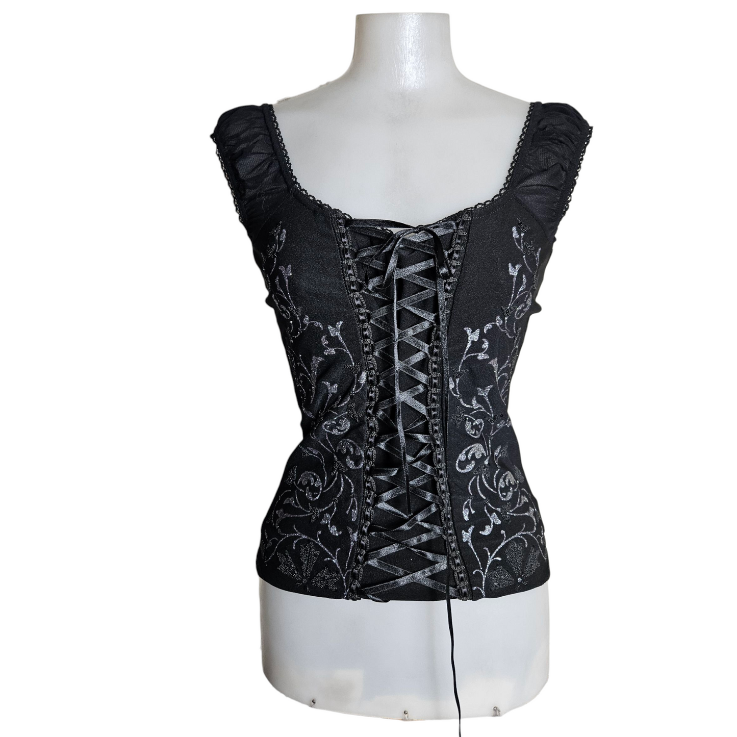 Lace-up top decorated with silver arabesques