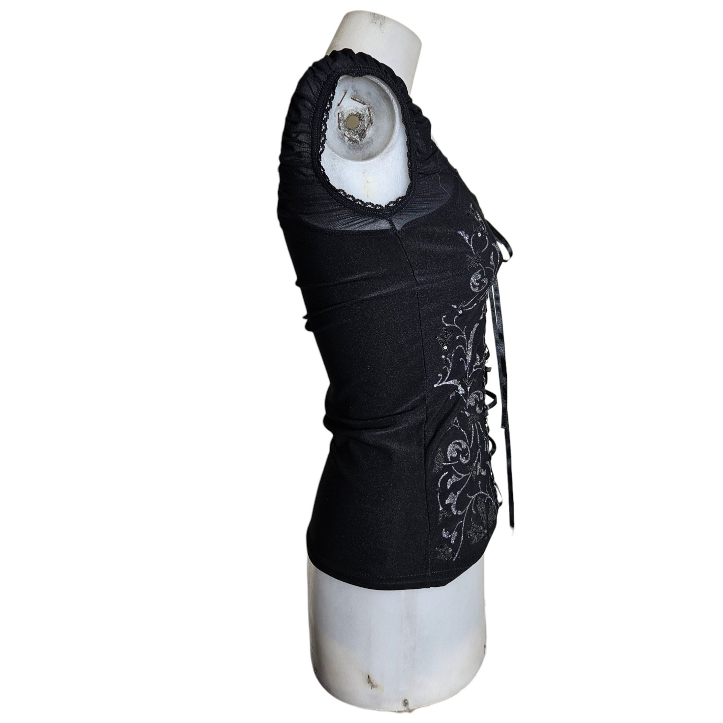 Lace-up top decorated with silver arabesques