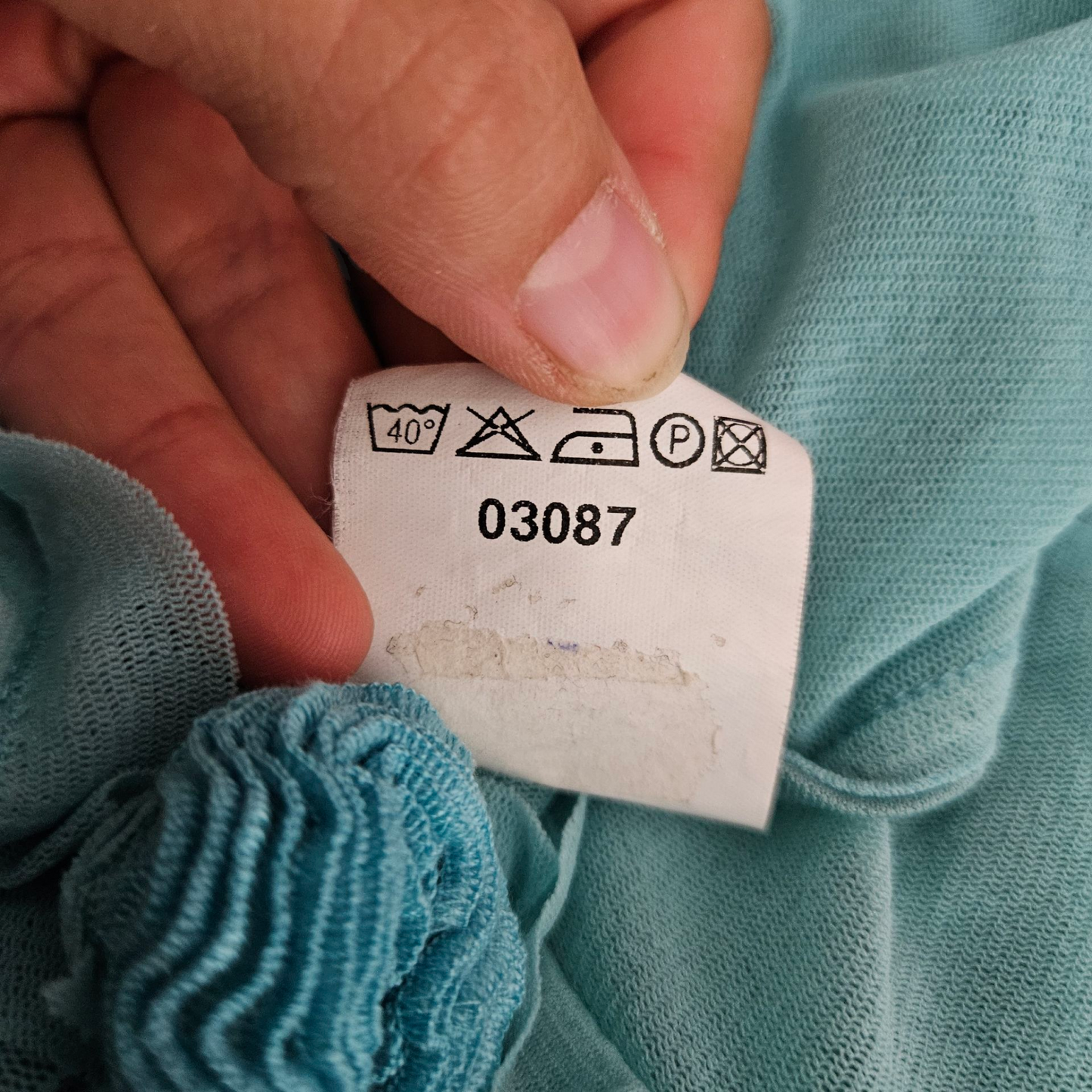 Haut en voile bleu détail laçage et fleurs
