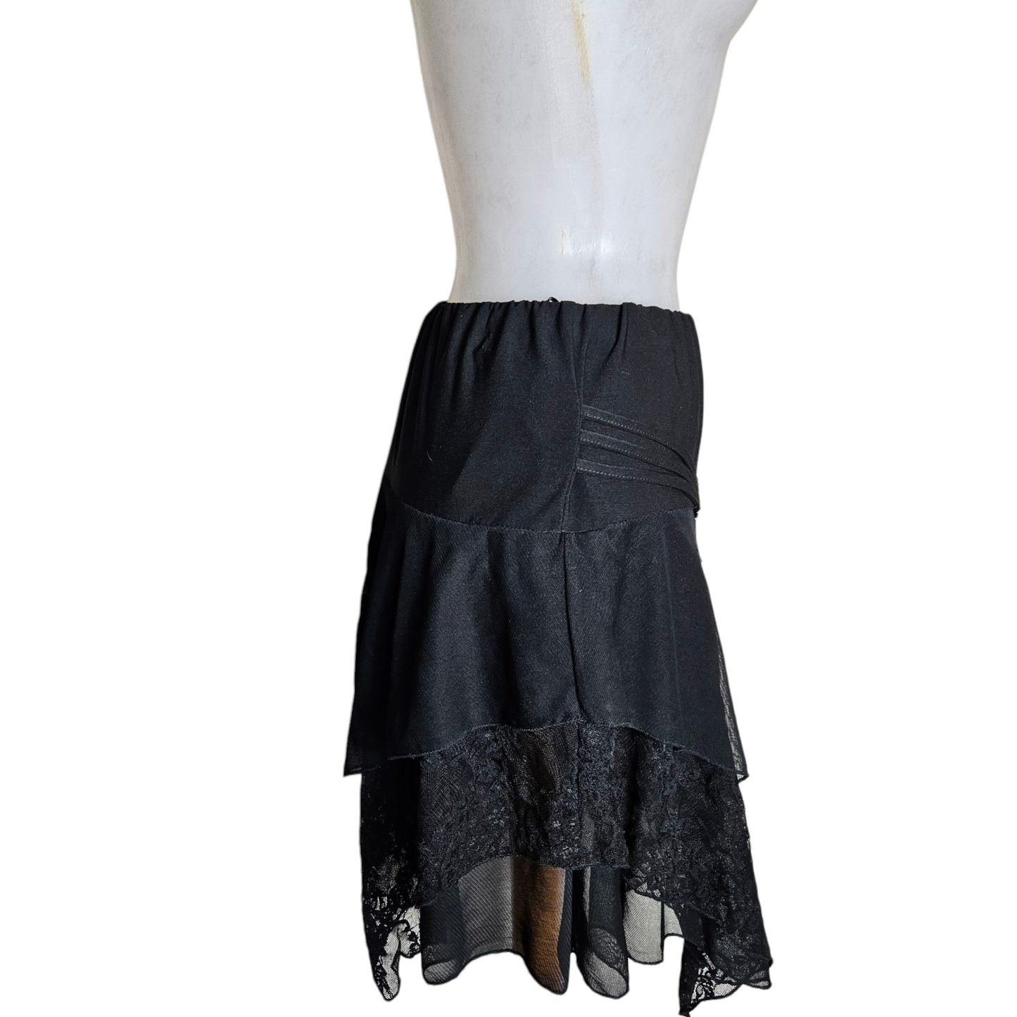 Asymmetrical lace skirt with chain details