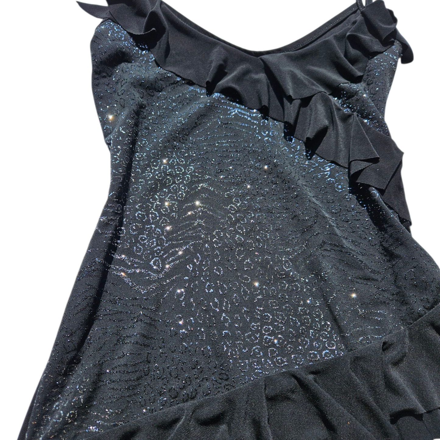 Asymmetrical top with rhinestones and ruffles