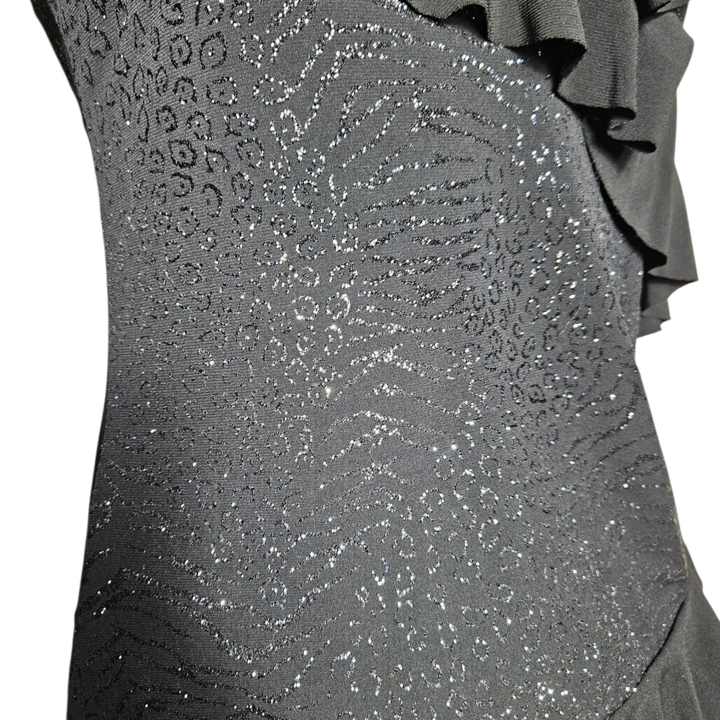 Asymmetrical top with rhinestones and ruffles