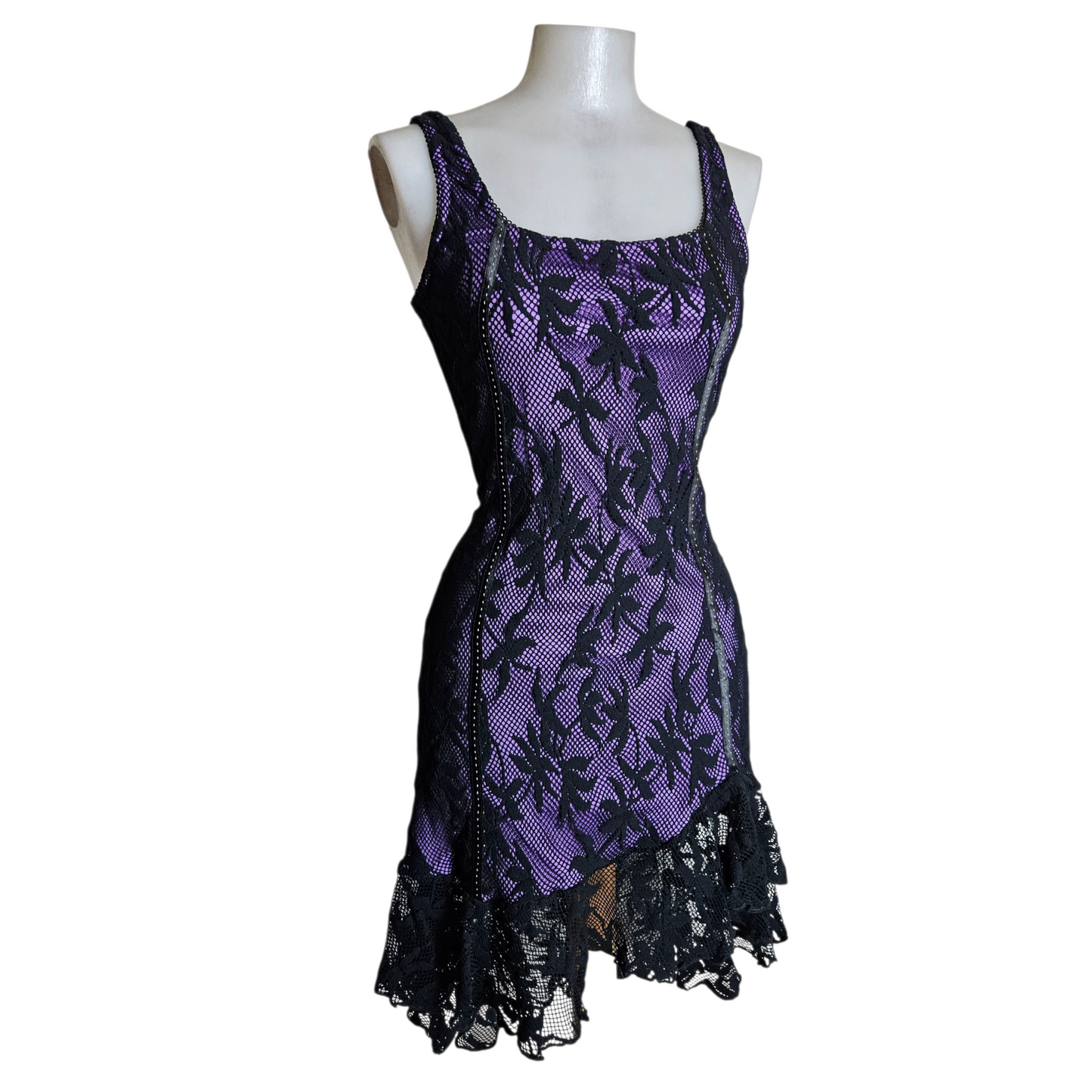 Black lace dress on a purple background