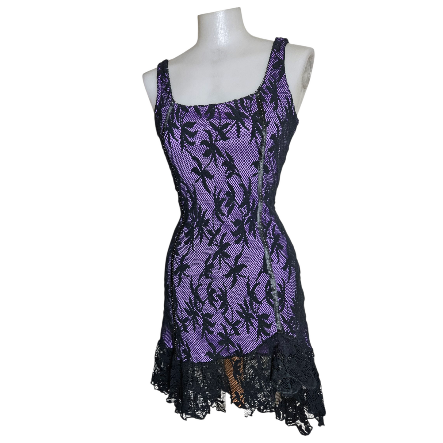 Black lace dress on a purple background