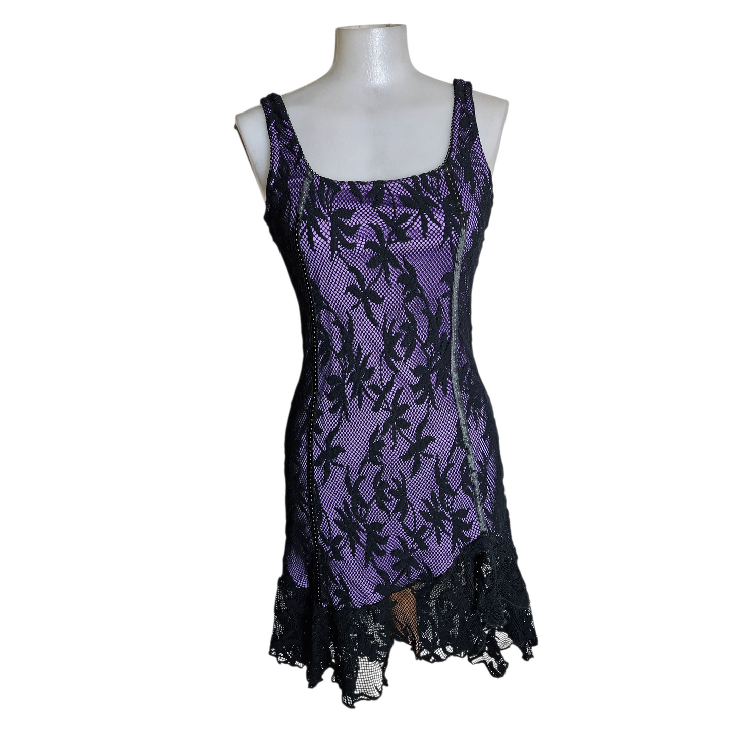 Black lace dress on a purple background