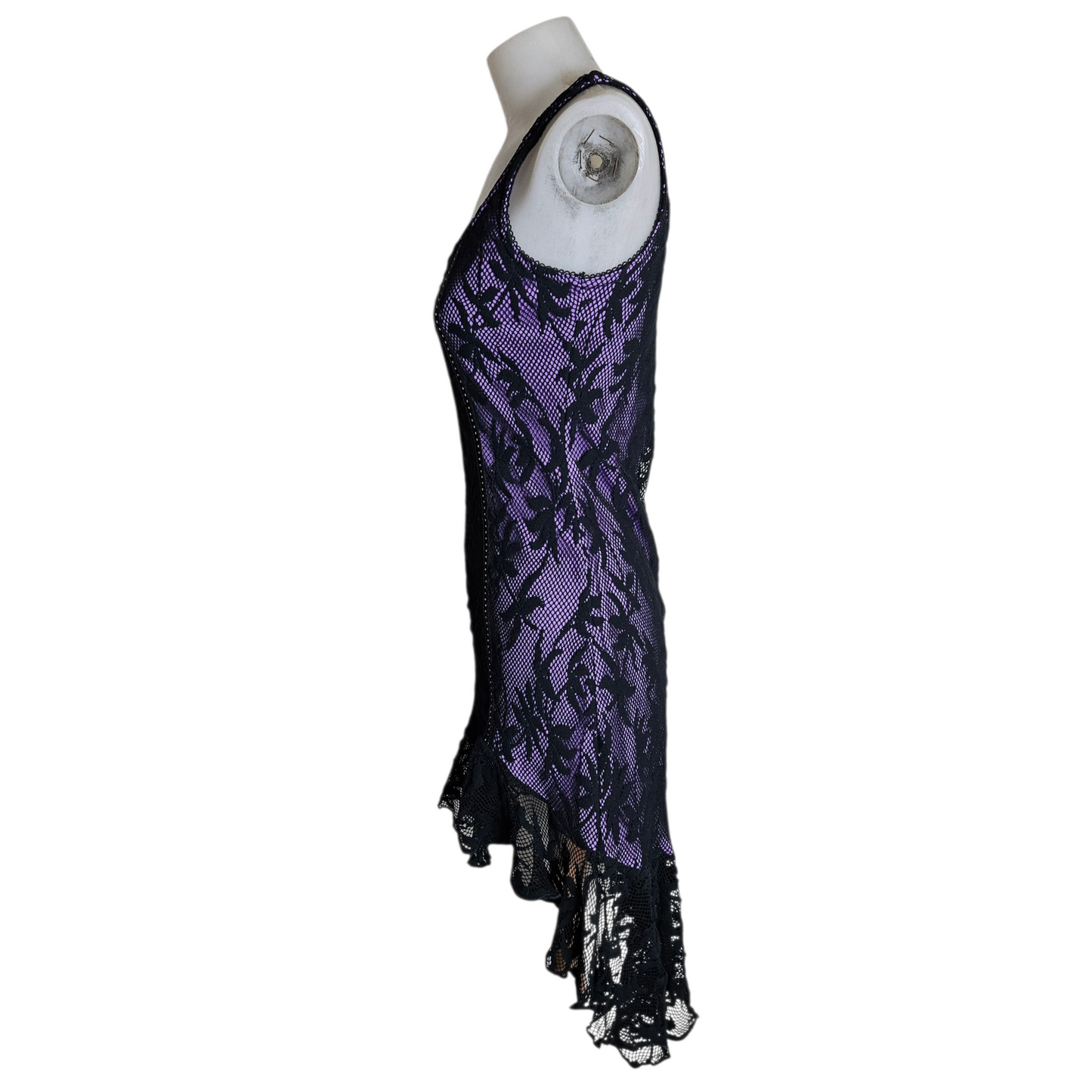 Black lace dress on a purple background