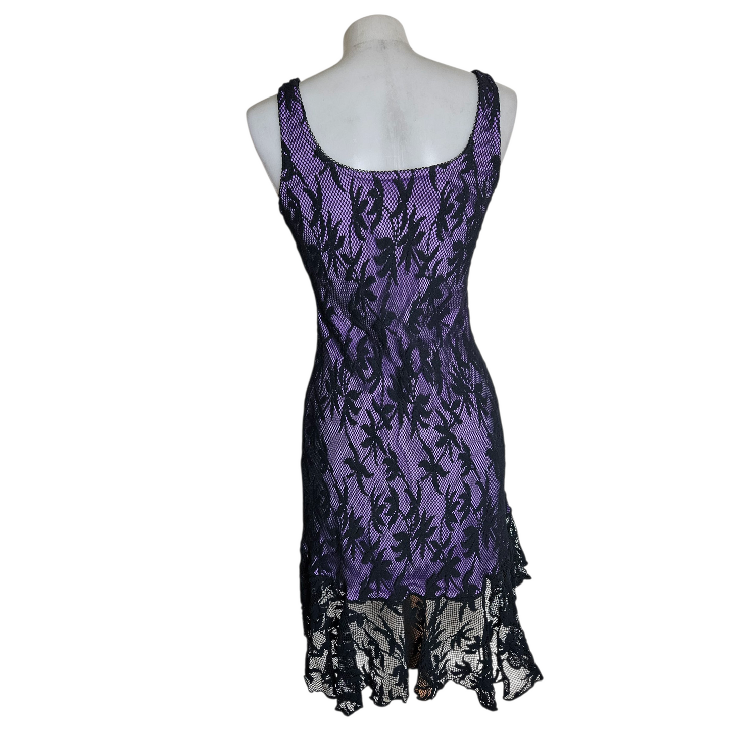 Black lace dress on a purple background