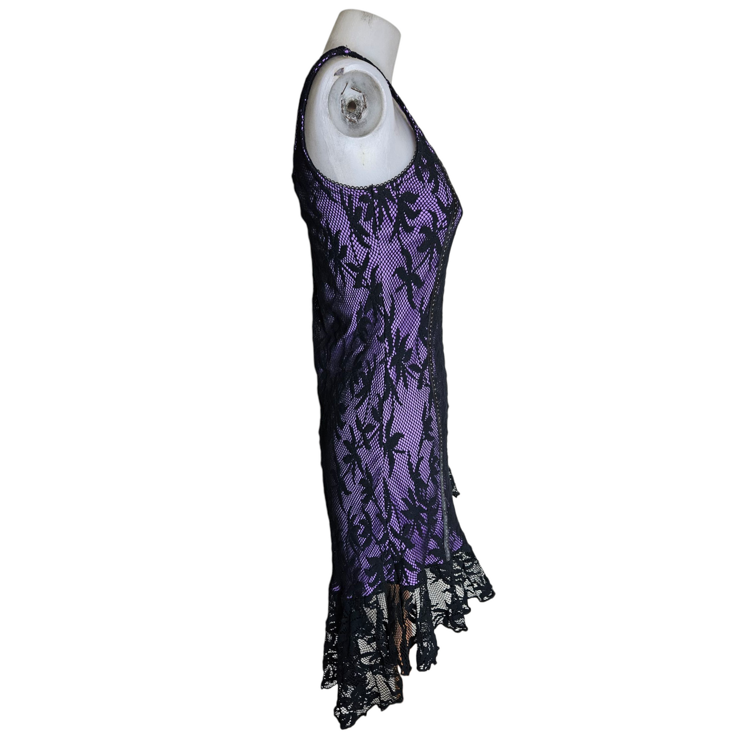 Black lace dress on a purple background