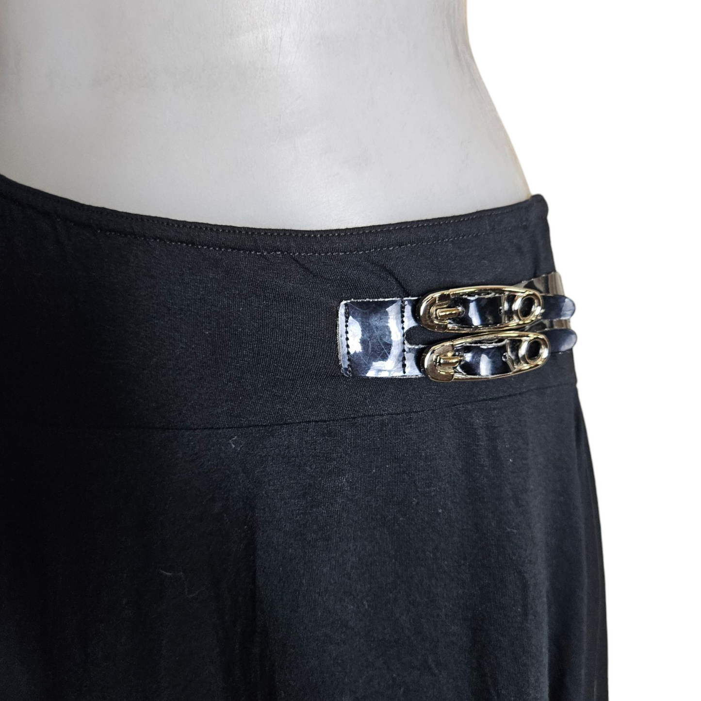 Black asymmetrical skirt with strap details