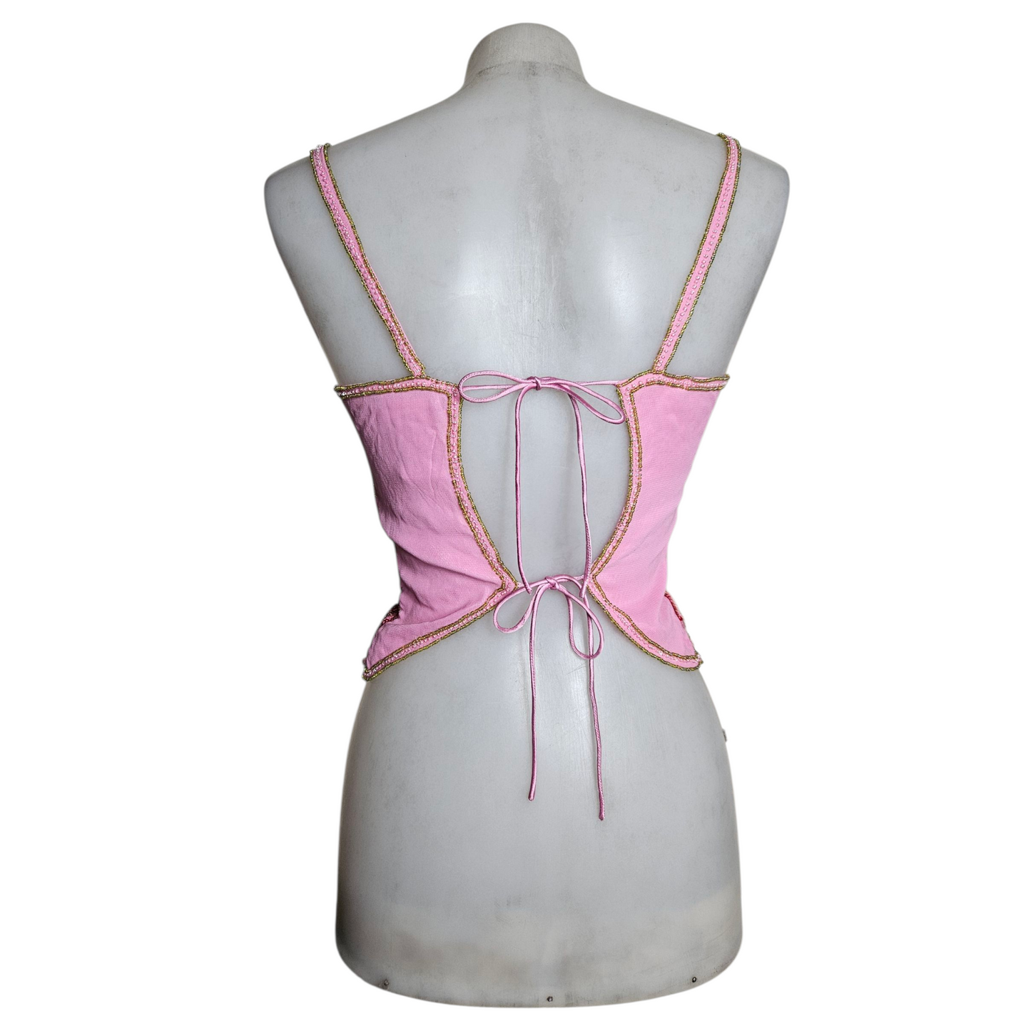 Haut dos nu en forme de papillon rose
