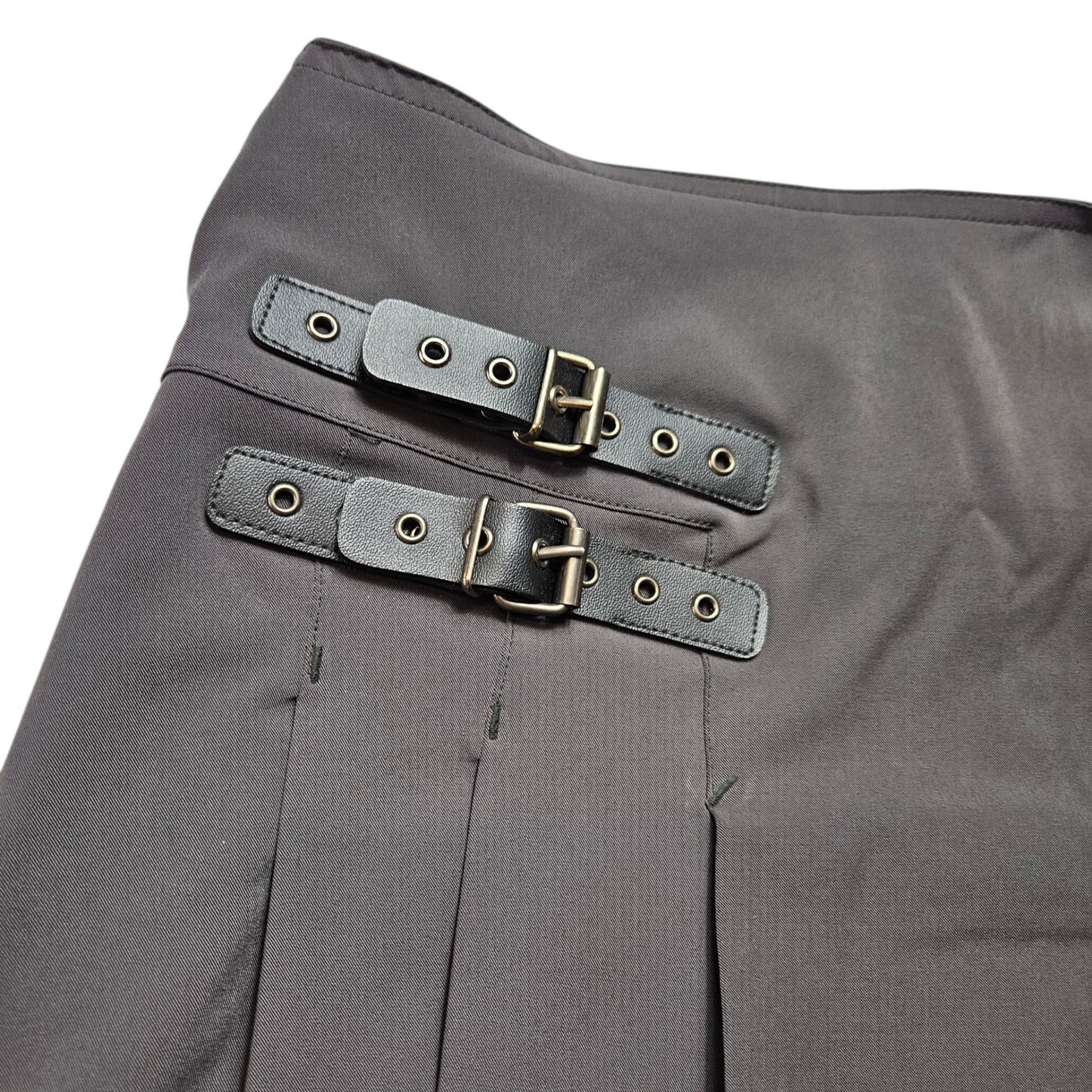Pleated mini skirt with straps