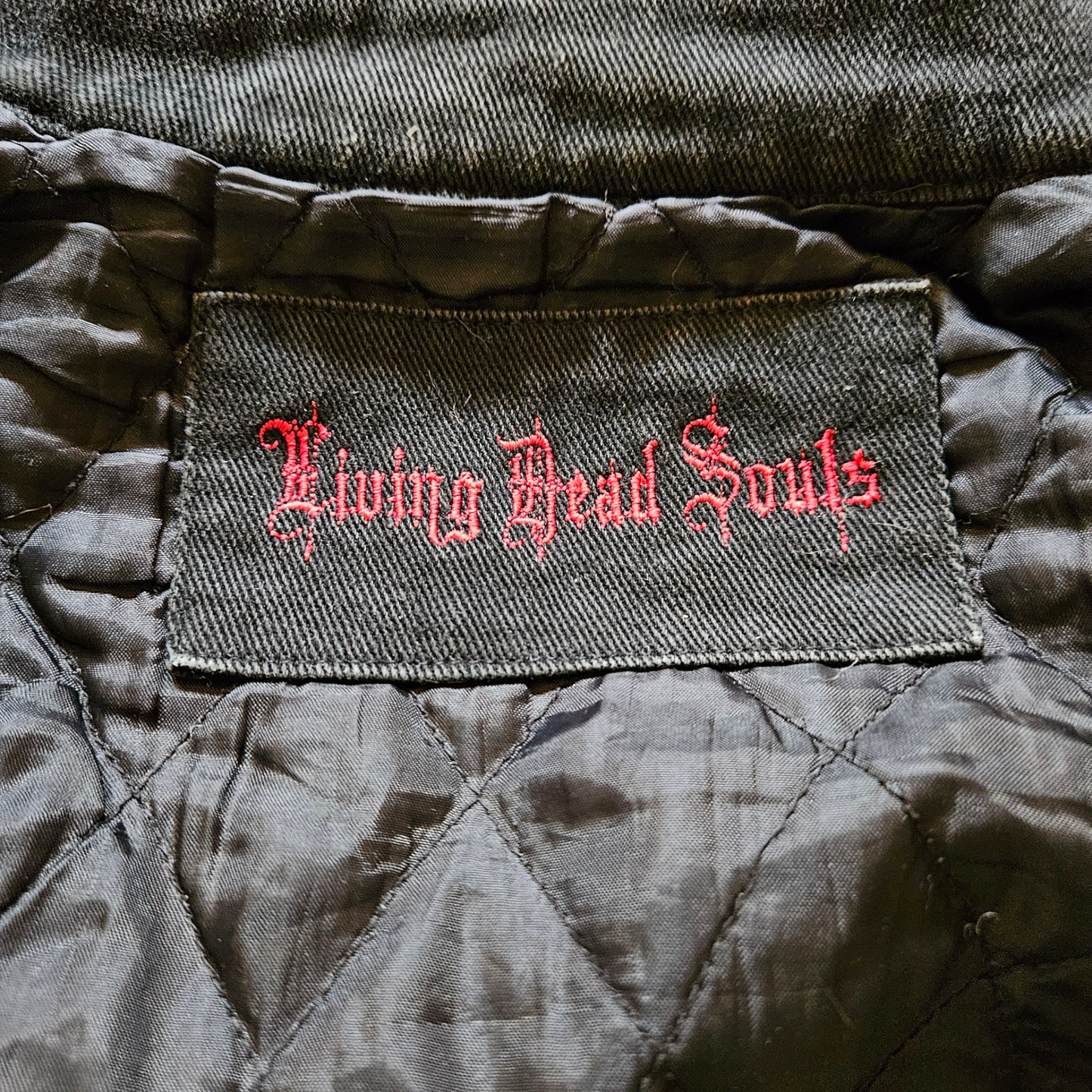 Denim jacket with lace-up details