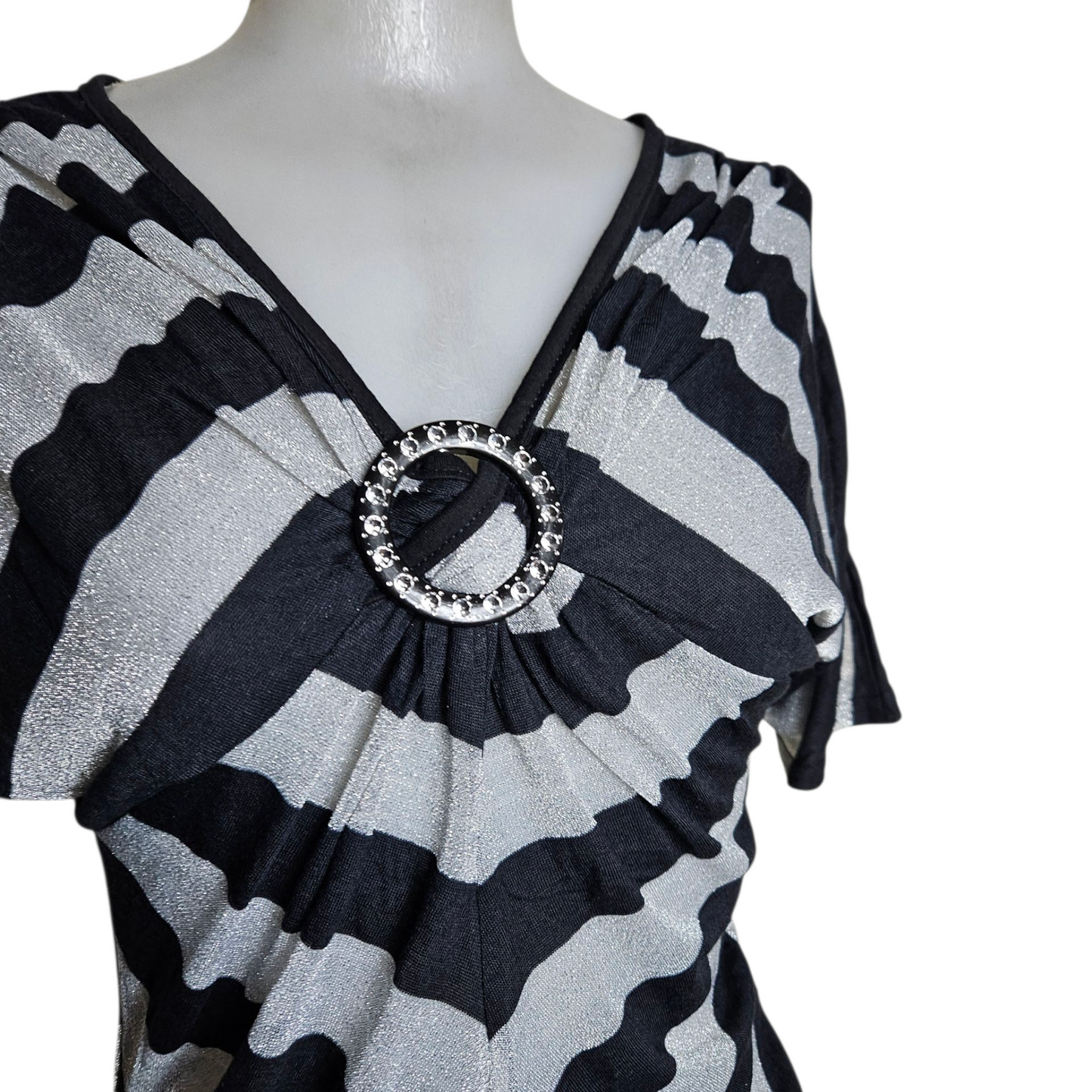 Striped top with buckle detail