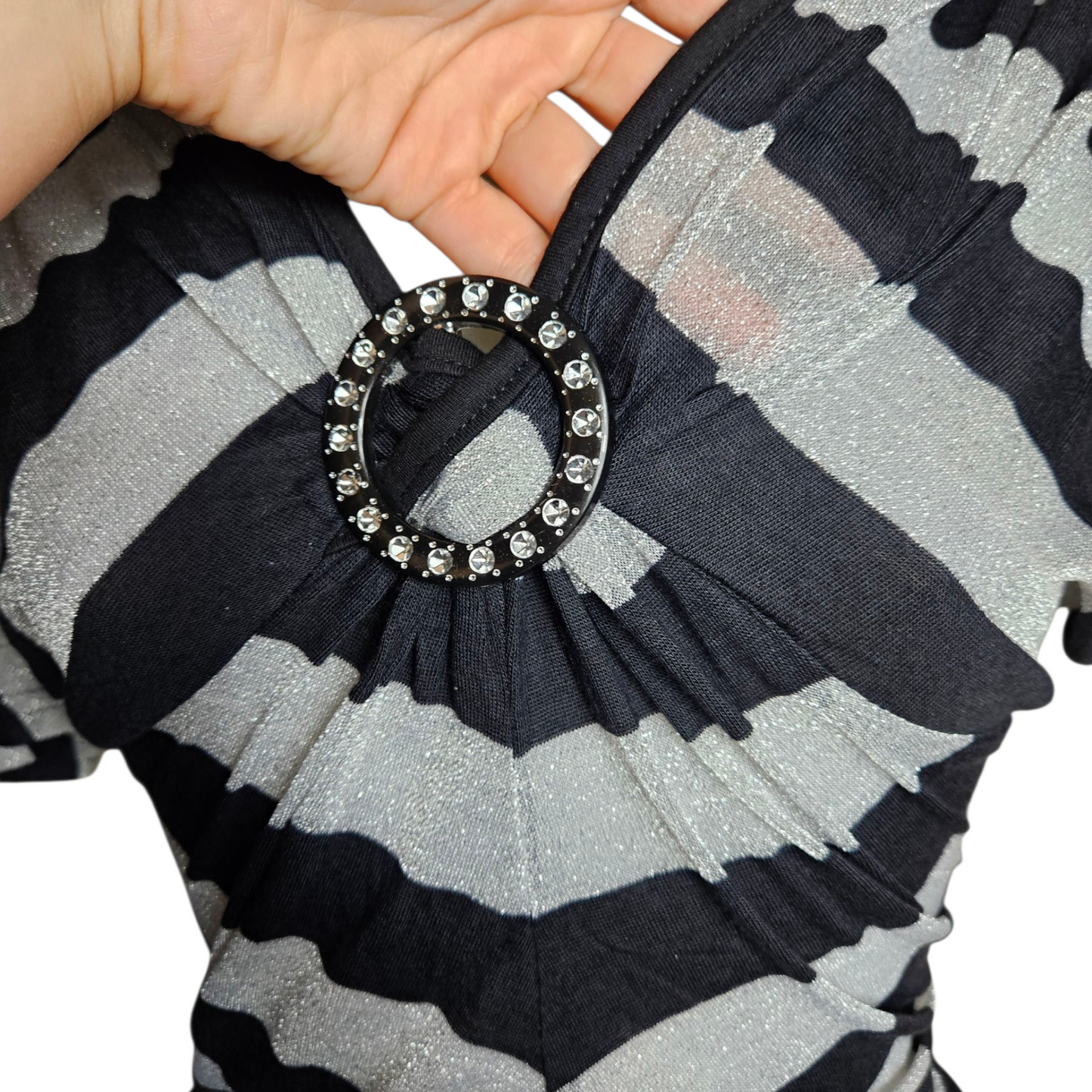 Striped top with buckle detail