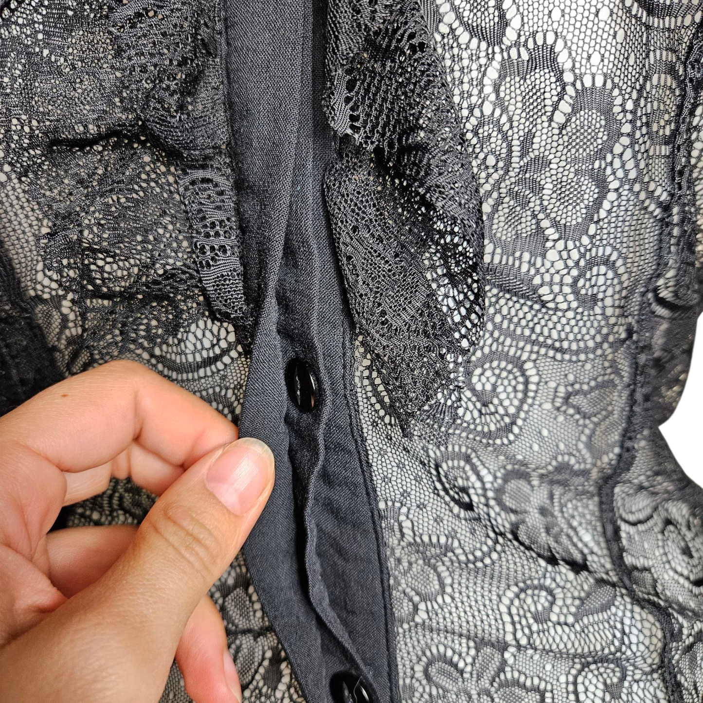 Black lace blouse with key buckle