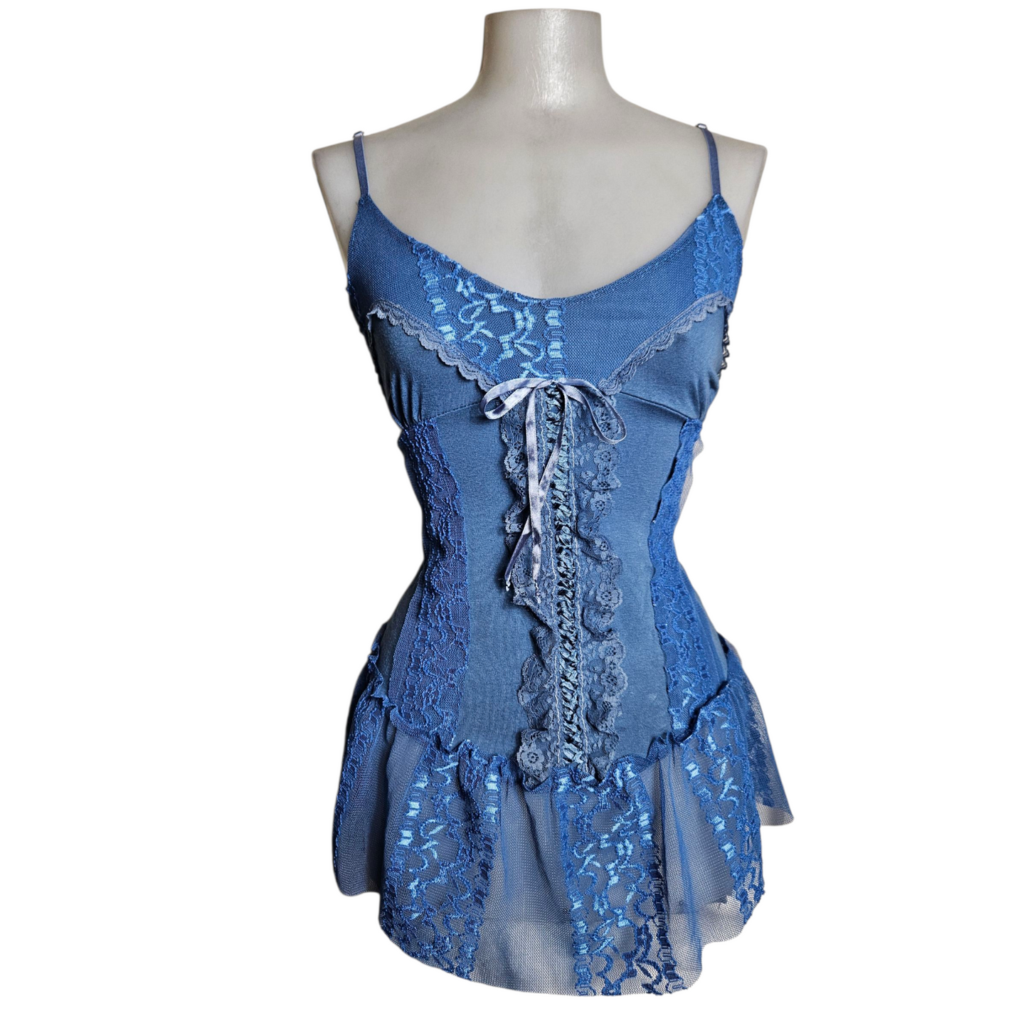 Blue asymmetrical top with lace and lacing