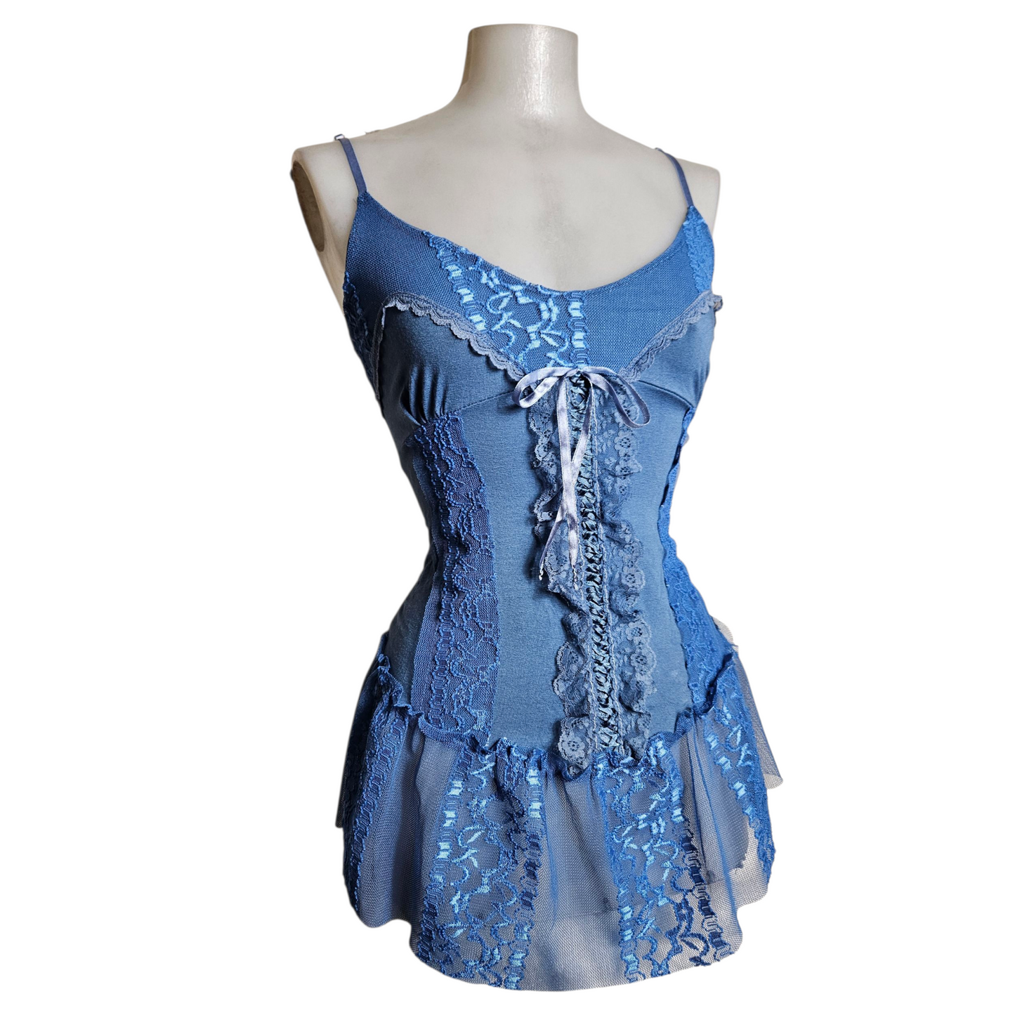 Blue asymmetrical top with lace and lacing
