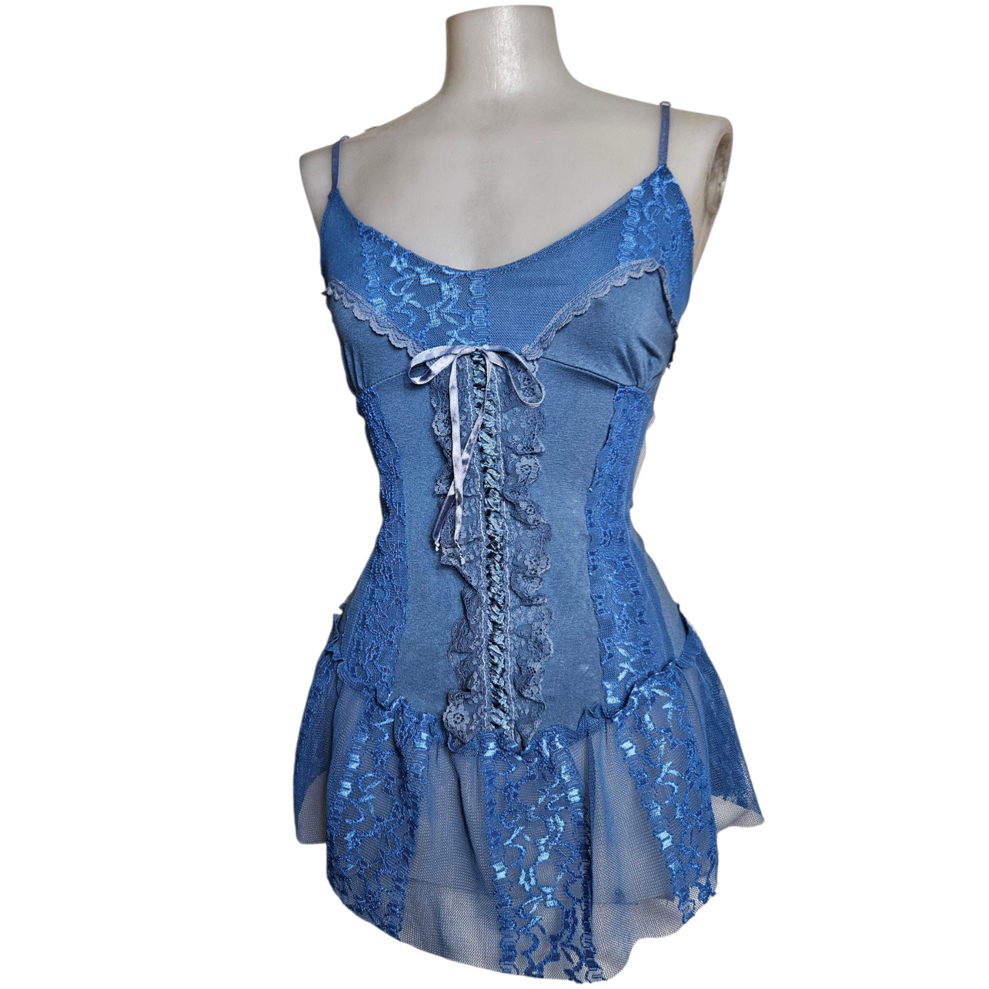 Blue asymmetrical top with lace and lacing