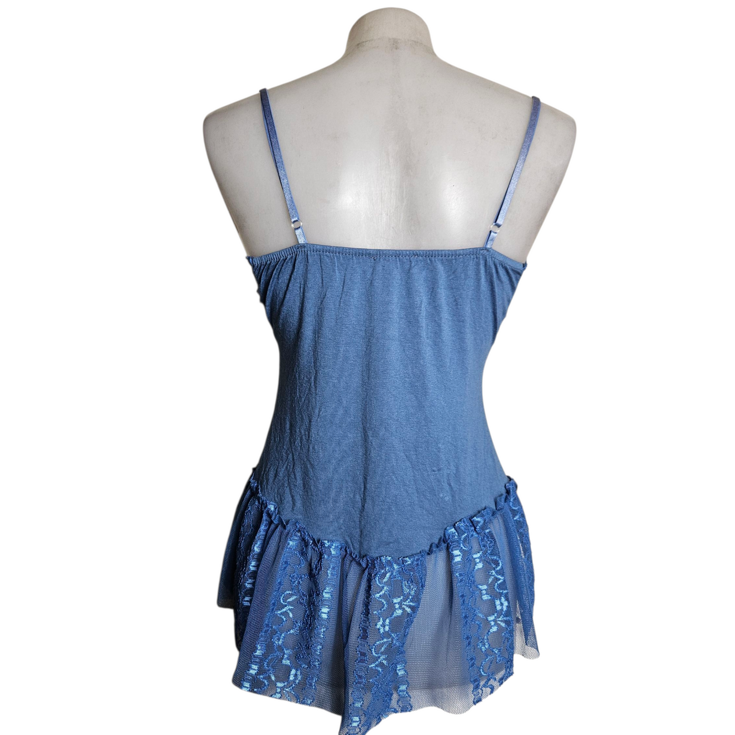 Blue asymmetrical top with lace and lacing