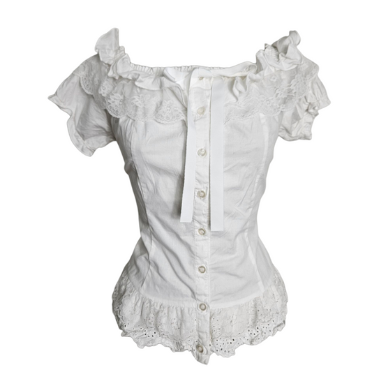 Haut romantique avec manches légèrement bouffantes