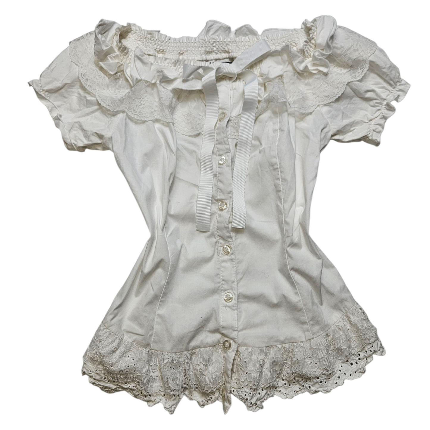 Haut romantique avec manches légèrement bouffantes