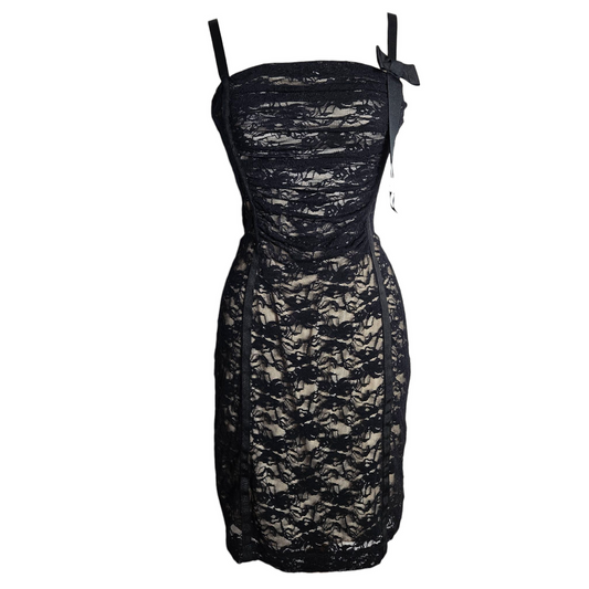 Vintage black lace corset-style mini dress with delicate straps and ribbon detail, elegant Y2K fairycore and dark whimsigoth aesthetic.