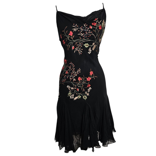 Vintage black chiffon dress with floral embroidery and spaghetti straps, photographed from the front on white background