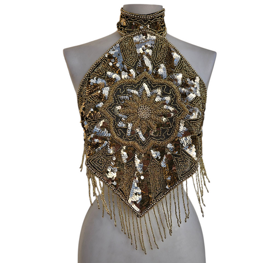 Dos nu brodé de sequins dorés