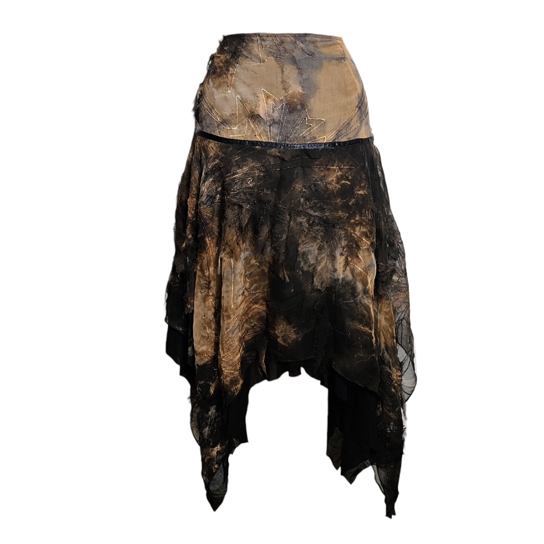 Vintage asymmetrical fairycore skirt in earth tones with tattered layers, tie-dye effects, and gold star embroidery, displayed on a mannequin against neutral background by Lucid Dream 2007