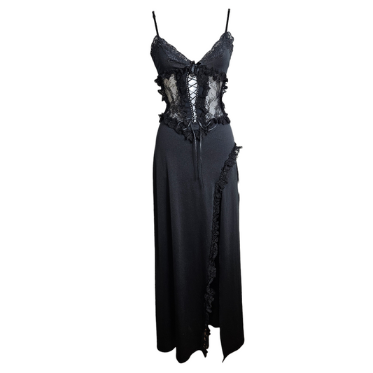 Vintage black maxi dress with a lace-up corset waist, sheer lace panels, ruffled trim, and a high side slit in a dark whimsigoth style photographed from the front on white background by Lucid Dream 2007