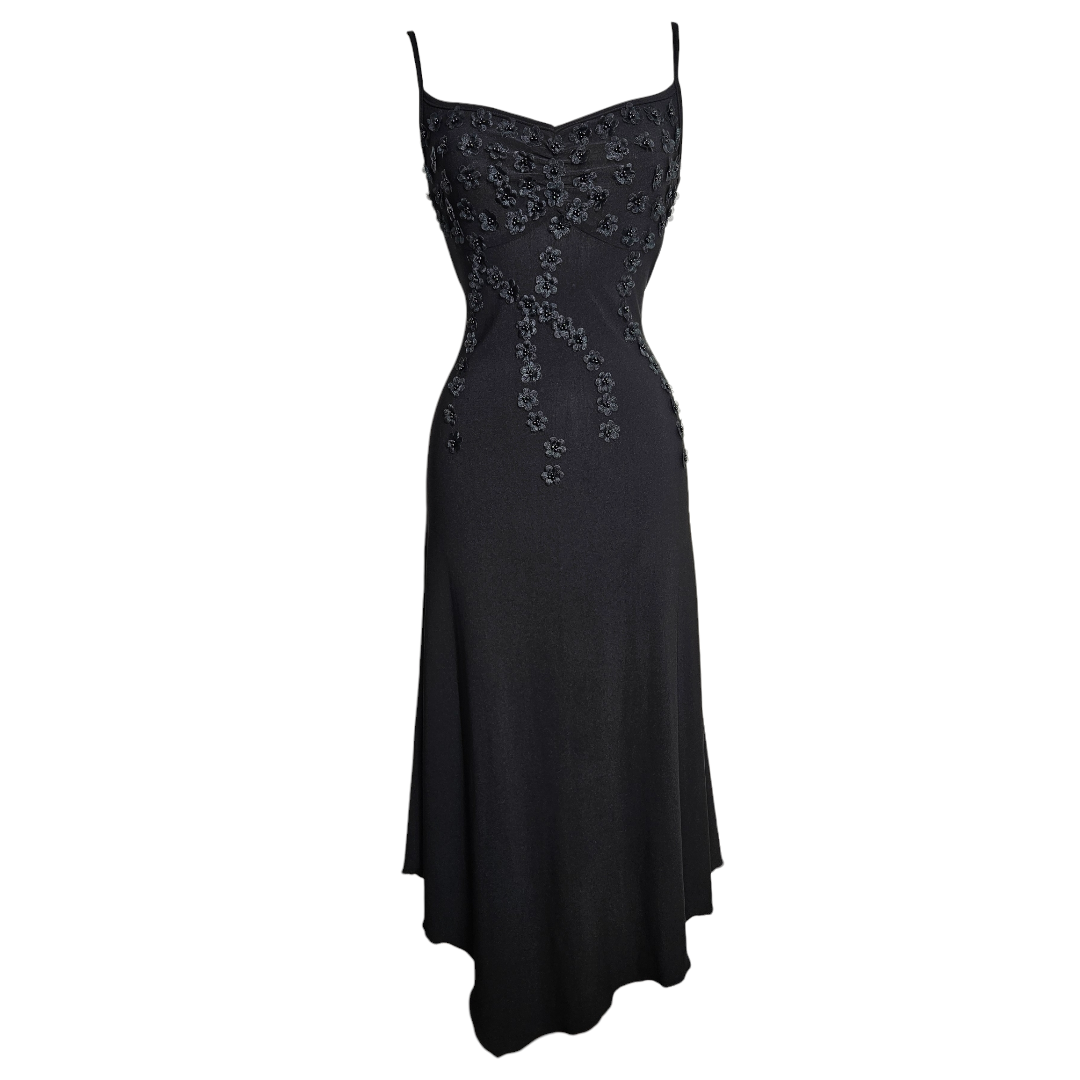 Vintage black spaghetti strap midi dress decorated with 3D beaded floral appliqués cascading down the bodice in a romantic whimsigoth aesthetic photographed on a mannequin against neutral background by Lucid Dream 2007