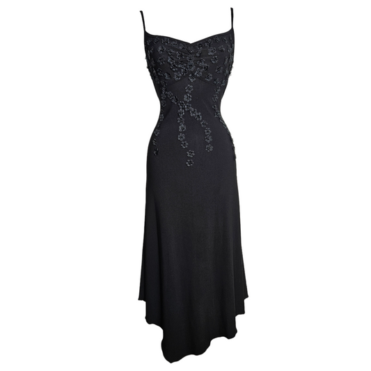 Vintage black spaghetti strap midi dress decorated with 3D beaded floral appliqués cascading down the bodice in a romantic whimsigoth aesthetic photographed on a mannequin against neutral background by Lucid Dream 2007