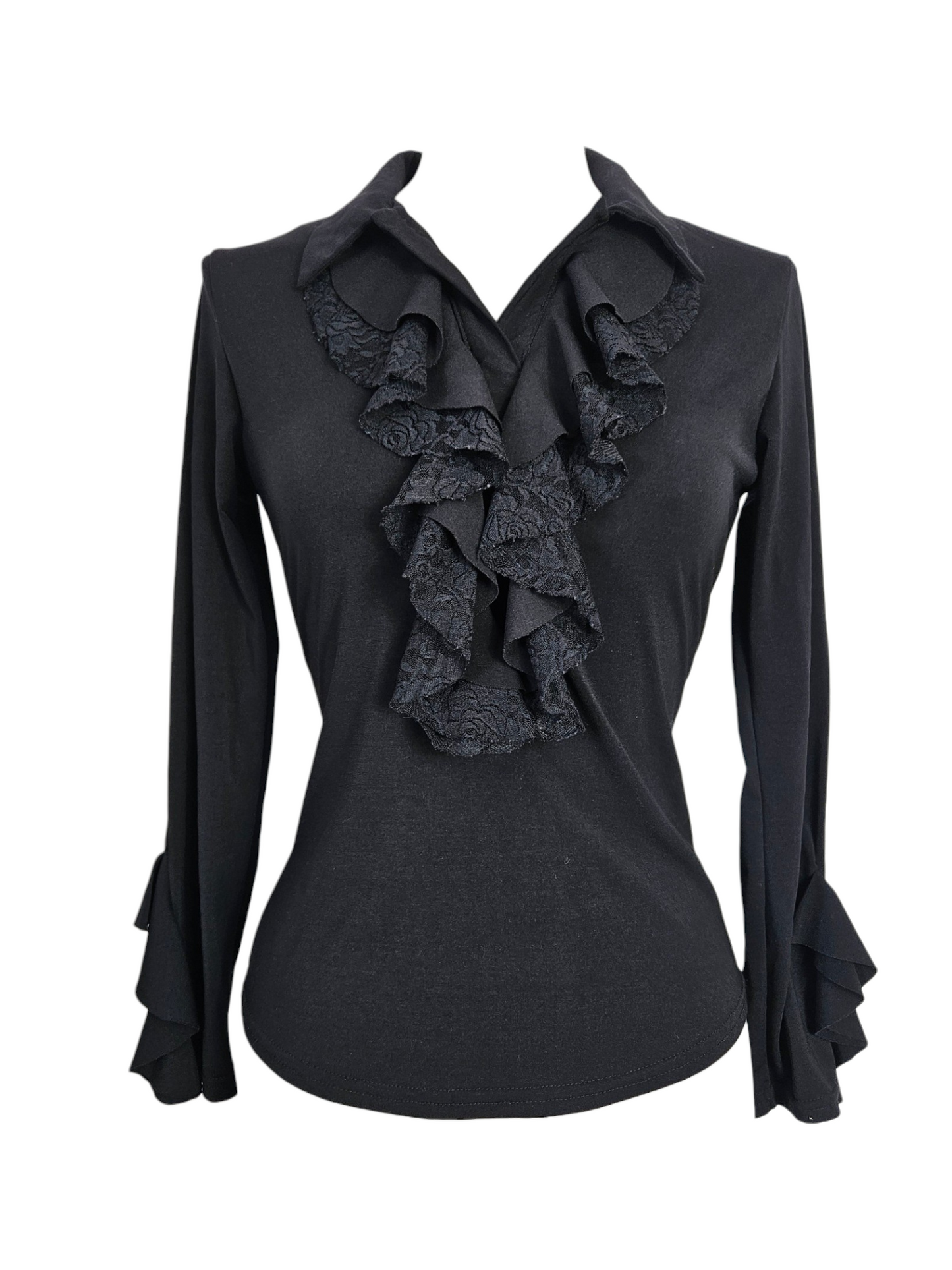 Black long-sleeve top featuring a lace-trimmed jabot ruffle neckline and tiered ruffle cuffs. Dark romantic Victorian aesthetic on a mannequin.