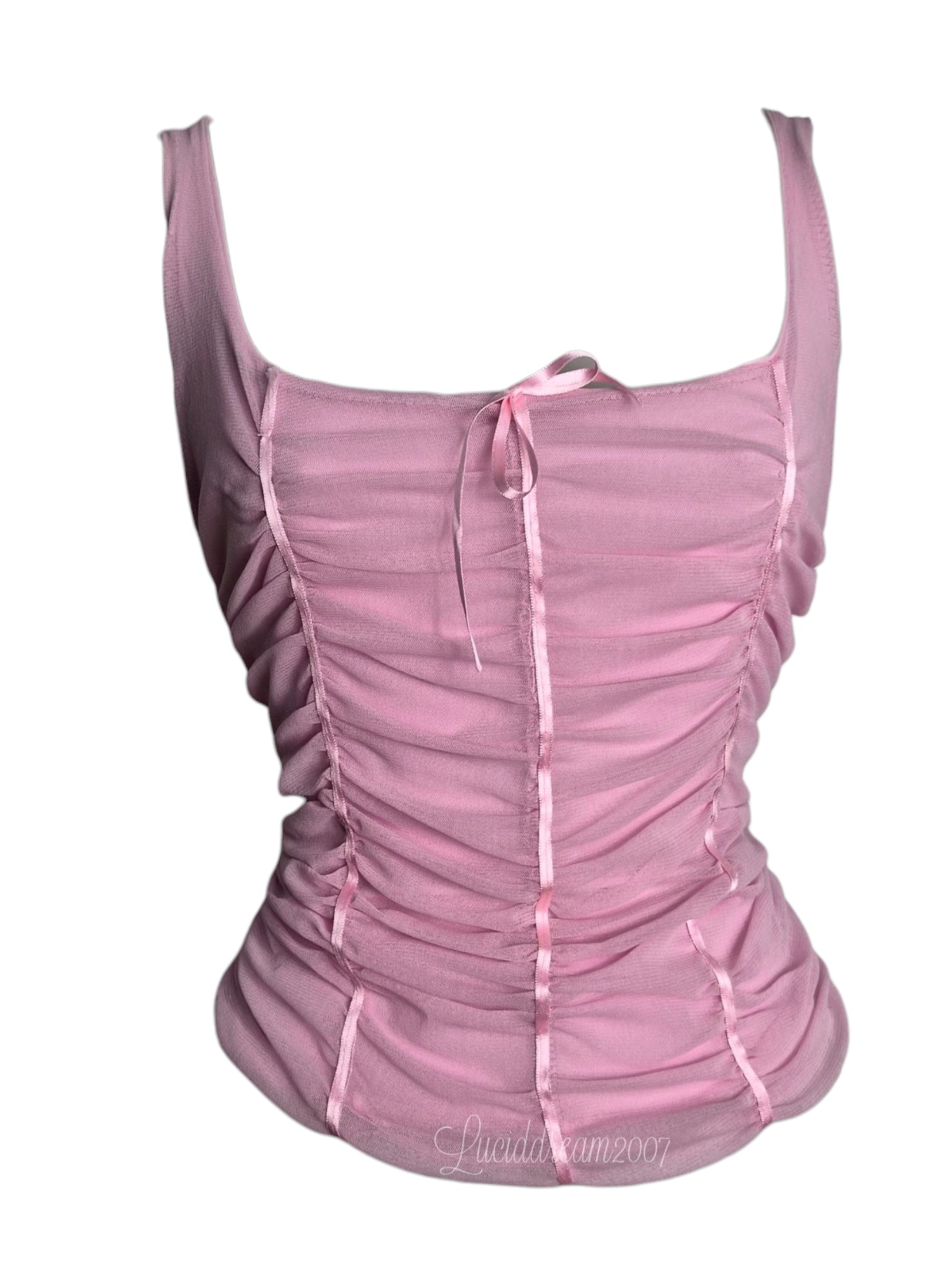 Top sans manches à larges bretelles avec encolure droite. Avec fronces et petits noeuds style coquette. Top vintage fairycore sorti d'une reverie.
